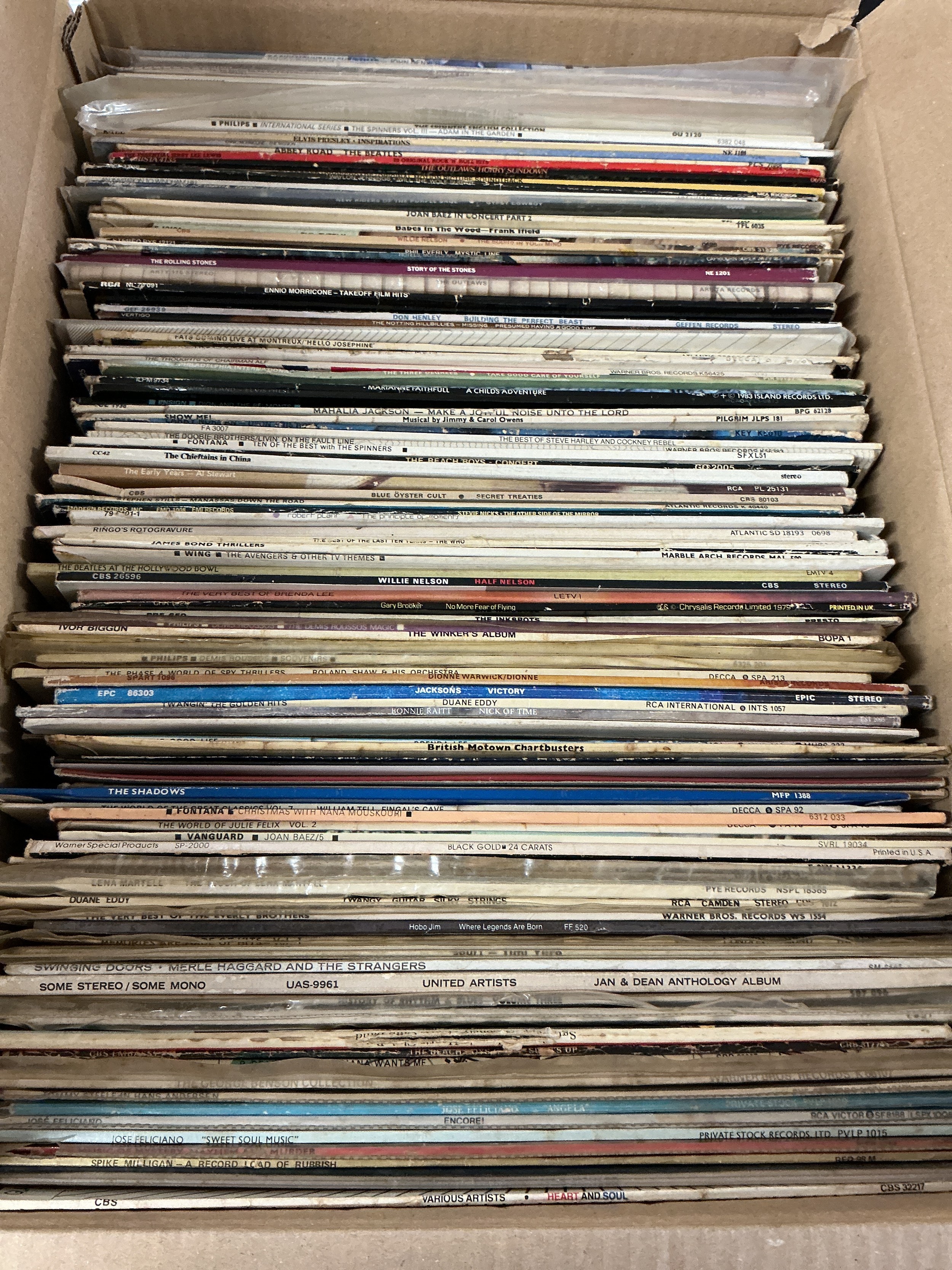 Two boxes of LPs by various artists including The Beatles, Queen, Rolling Stones, Eric Clapton and many more.