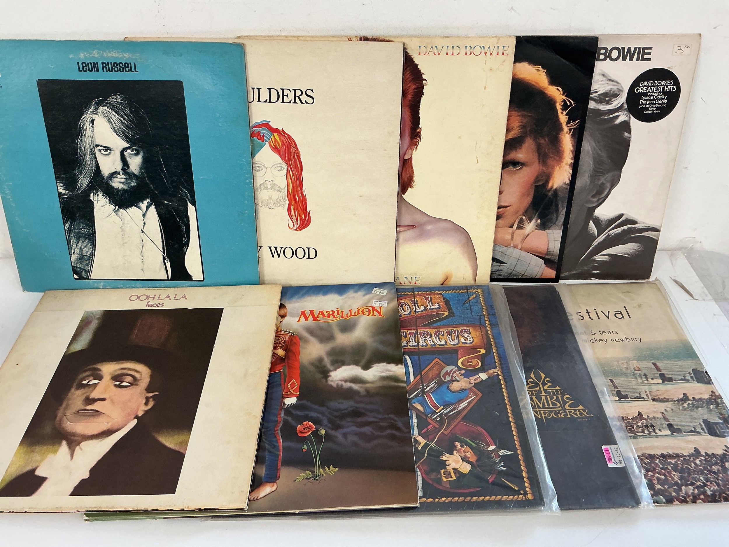 Thirty rock LPs by various artists including David Bowie, Jimmy Page, Marillion and others.