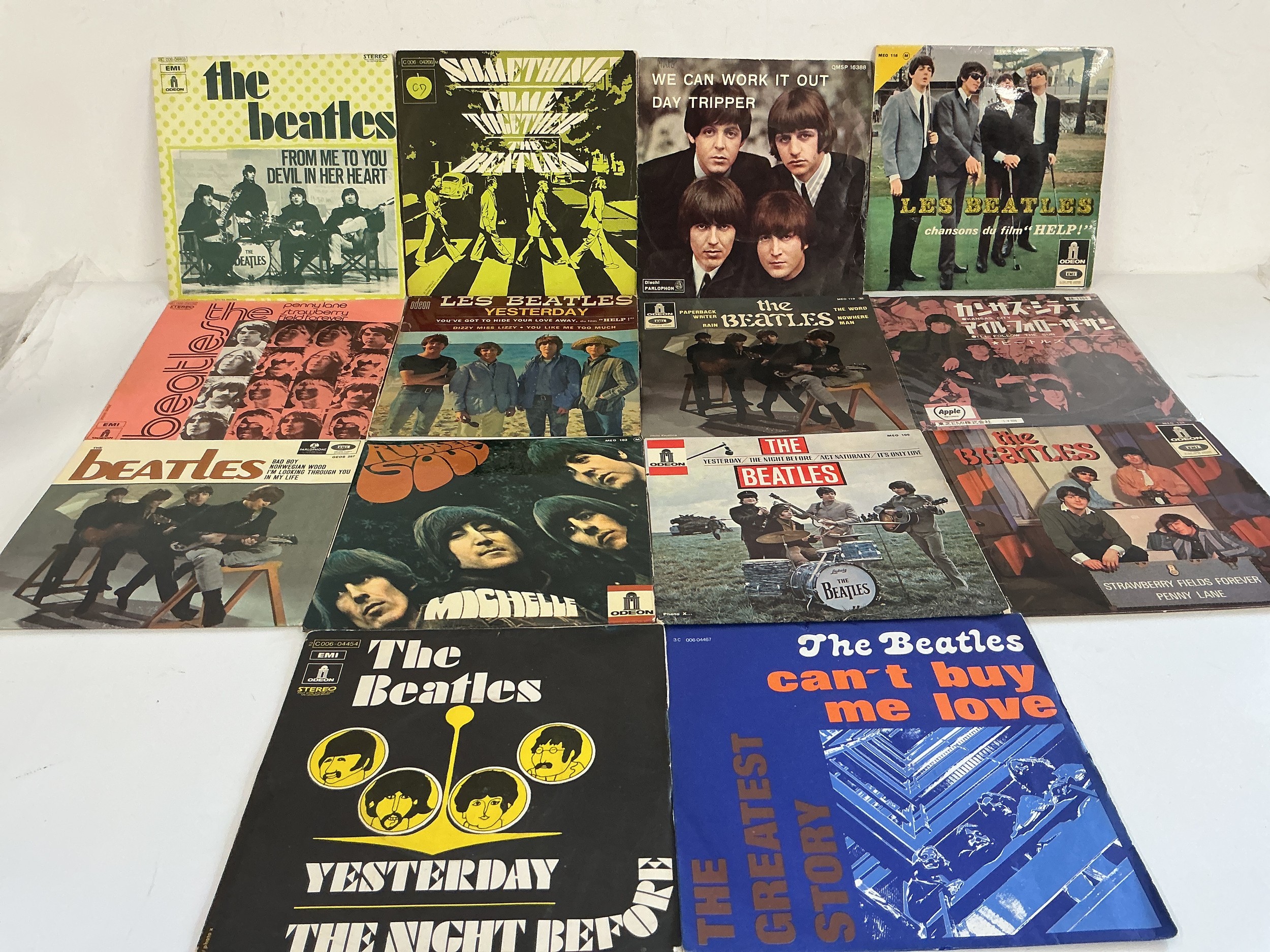 A collection of 14 foreign Beatles EPs comprising examples from France, Germany, Japan and others.