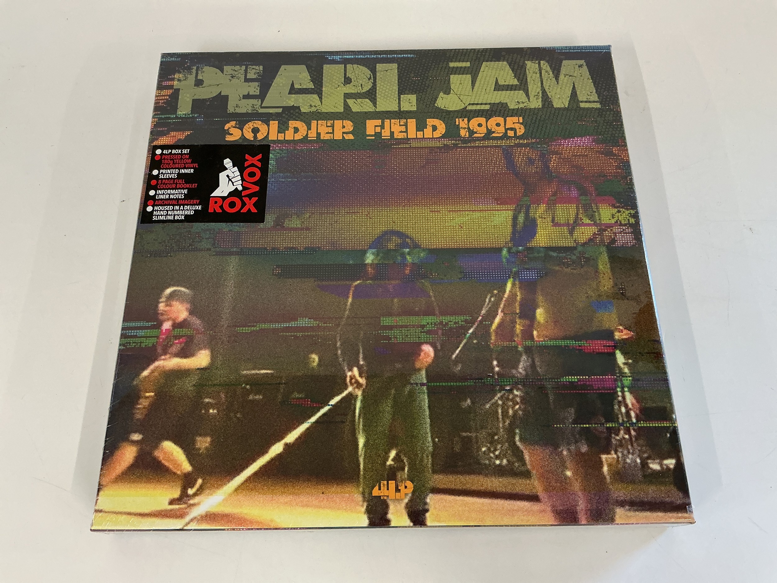 A sealed Pearl Jam - Soldier Field 1995 4LP coloured vinyl box set.