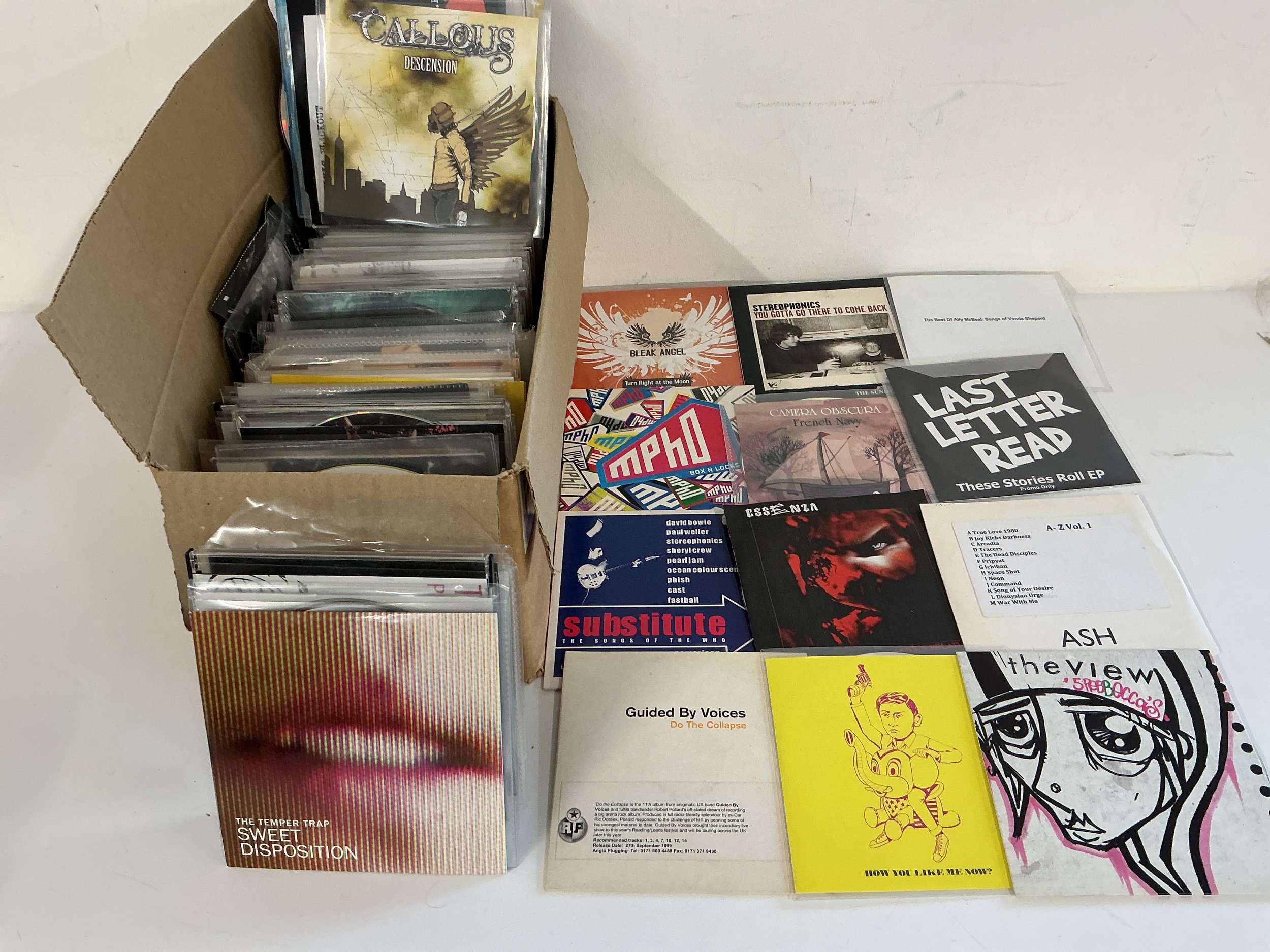 A box of promo CDs for various artists including Stereophonics, Ash, Craig David and many more.