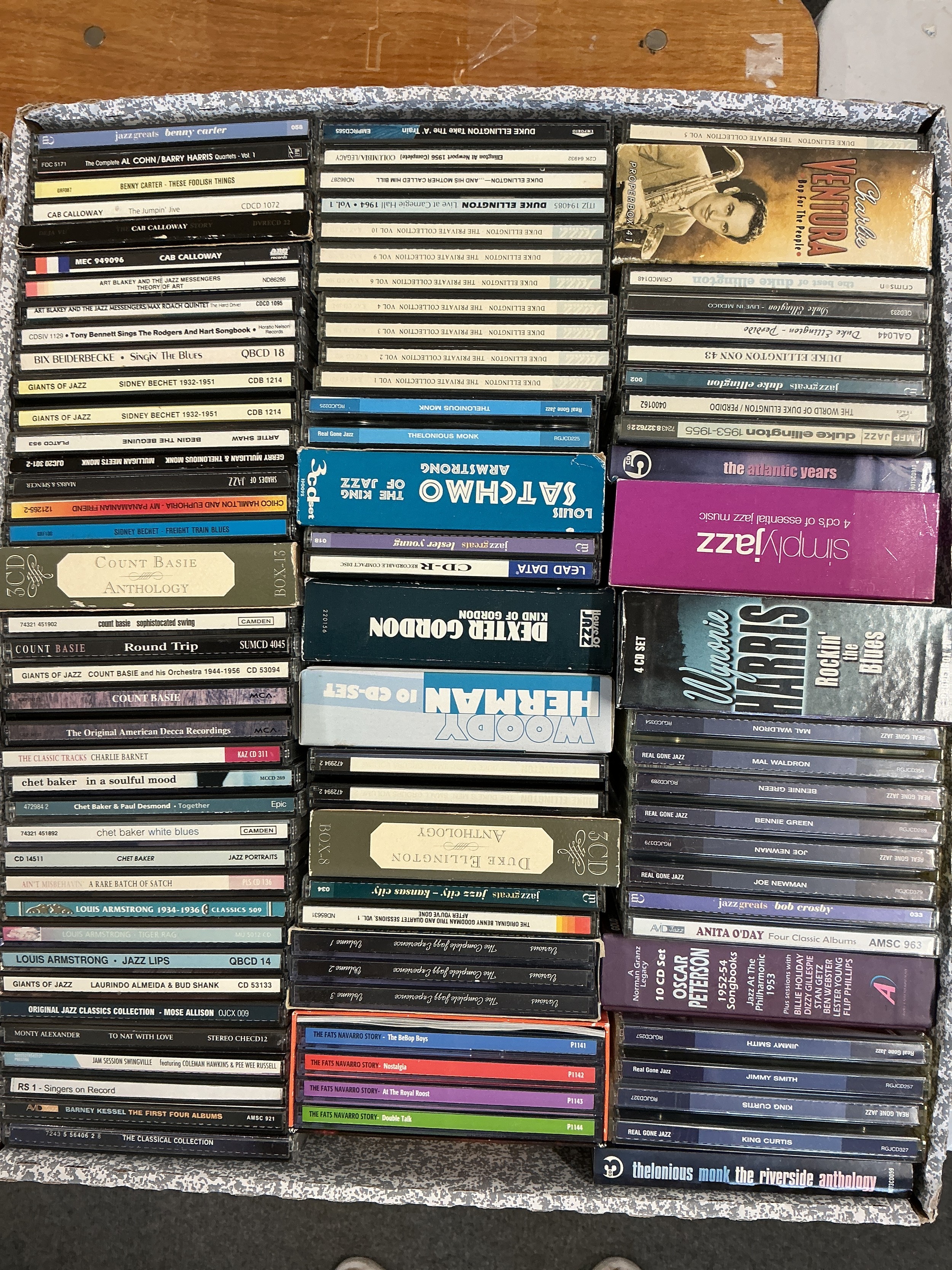 Three boxes of jazz and blues CDs including box sets. Various artists including Charlie Parker, Chet Baker, Sonny Boy Williamson, John Lee Hooker and many more.