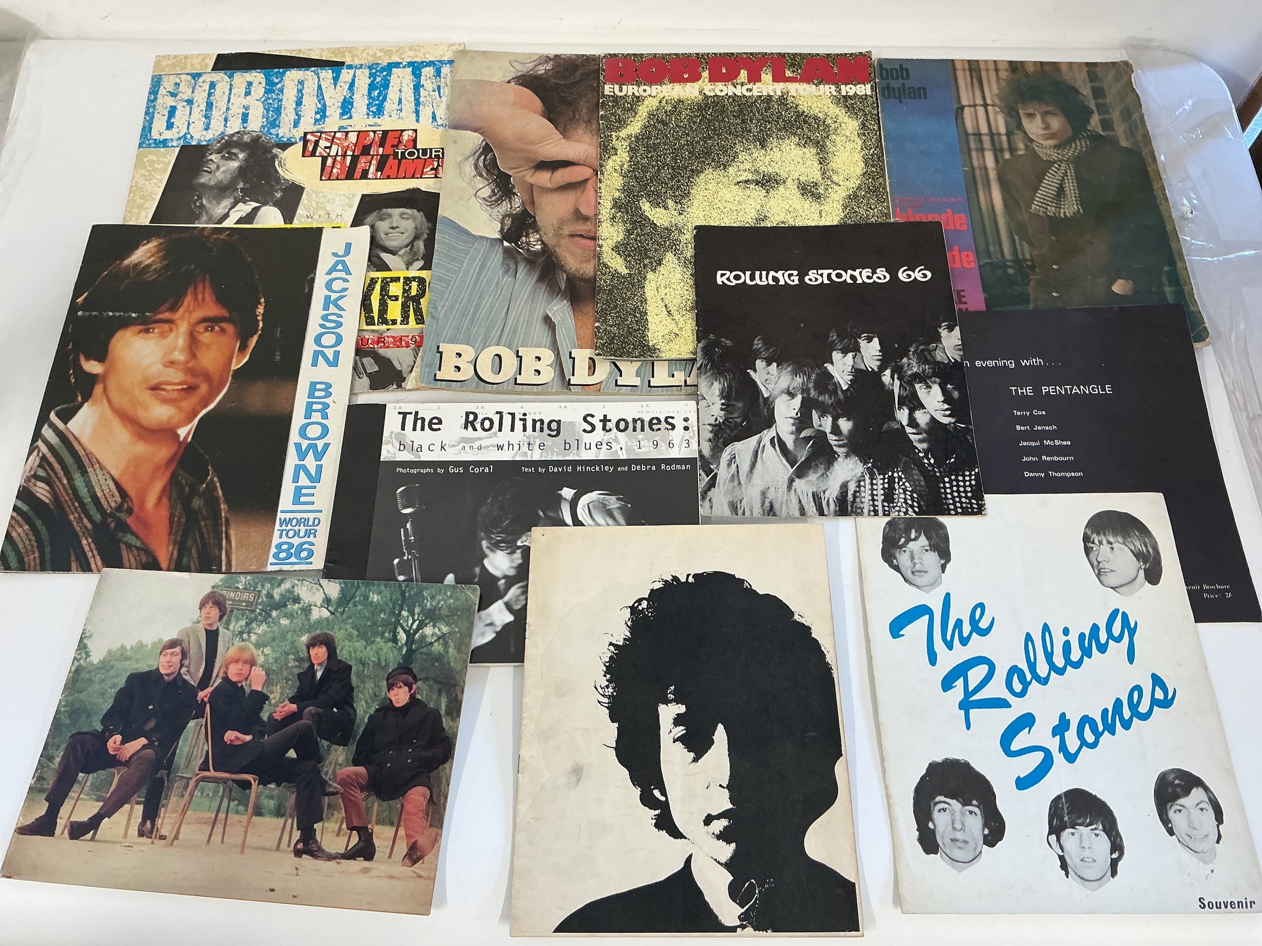 A collection of mainly 1960s tour programs comprising Bob Dylan '66, Rolling Stones 66 and others.