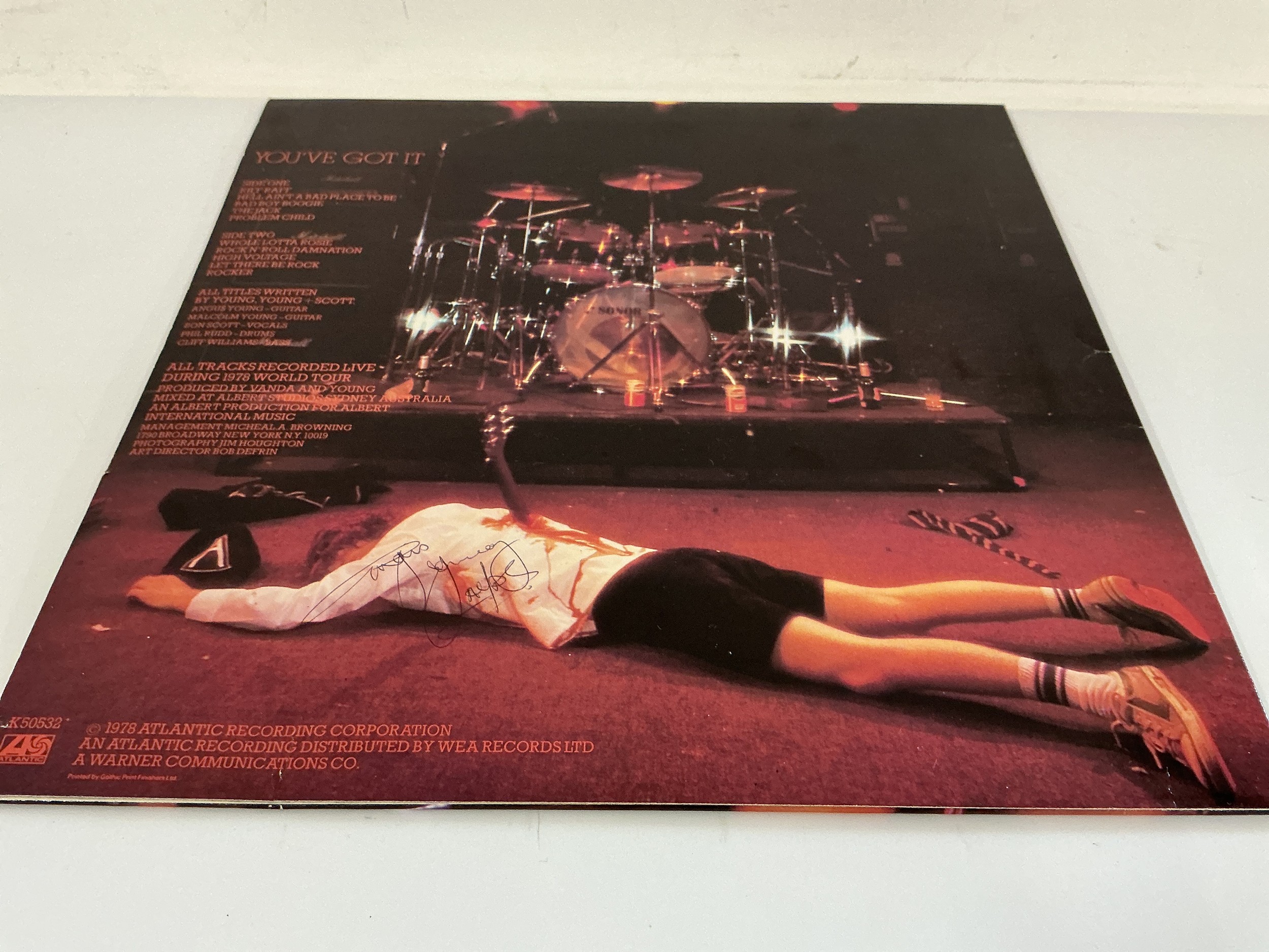 A 1978 Angus Young signed AC/DC - If You Want Blood You've Got It LP and a signed review. The vendor was lucky enough to meet the band backstage and obtained the signature face to face at the Southampton Gaumont 7th November 1978. Please see images attached. More provenance available upon request.