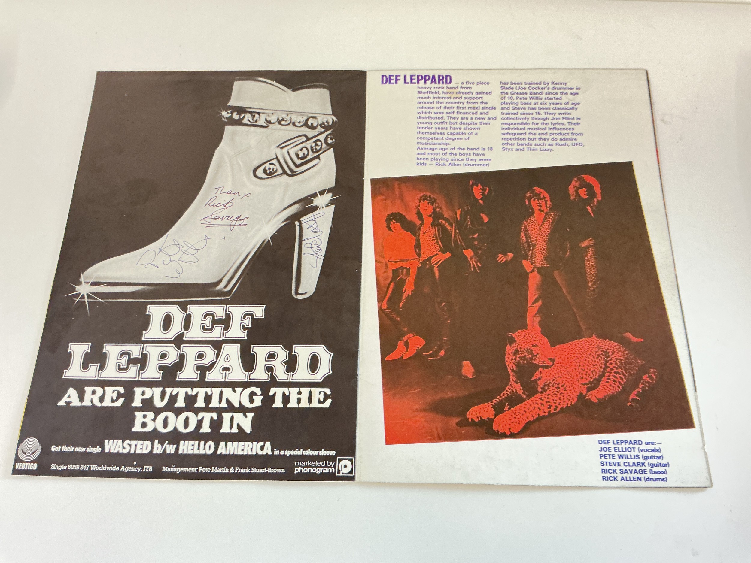 A 1979 AC/DC tour program signed by the support act Def Leppard. Signed by Pete Willis, Steve Clarke, Joe Elliott (using his fingernail as no pen was available!) and Rick Savage. Comes with a ticket from the same gig.