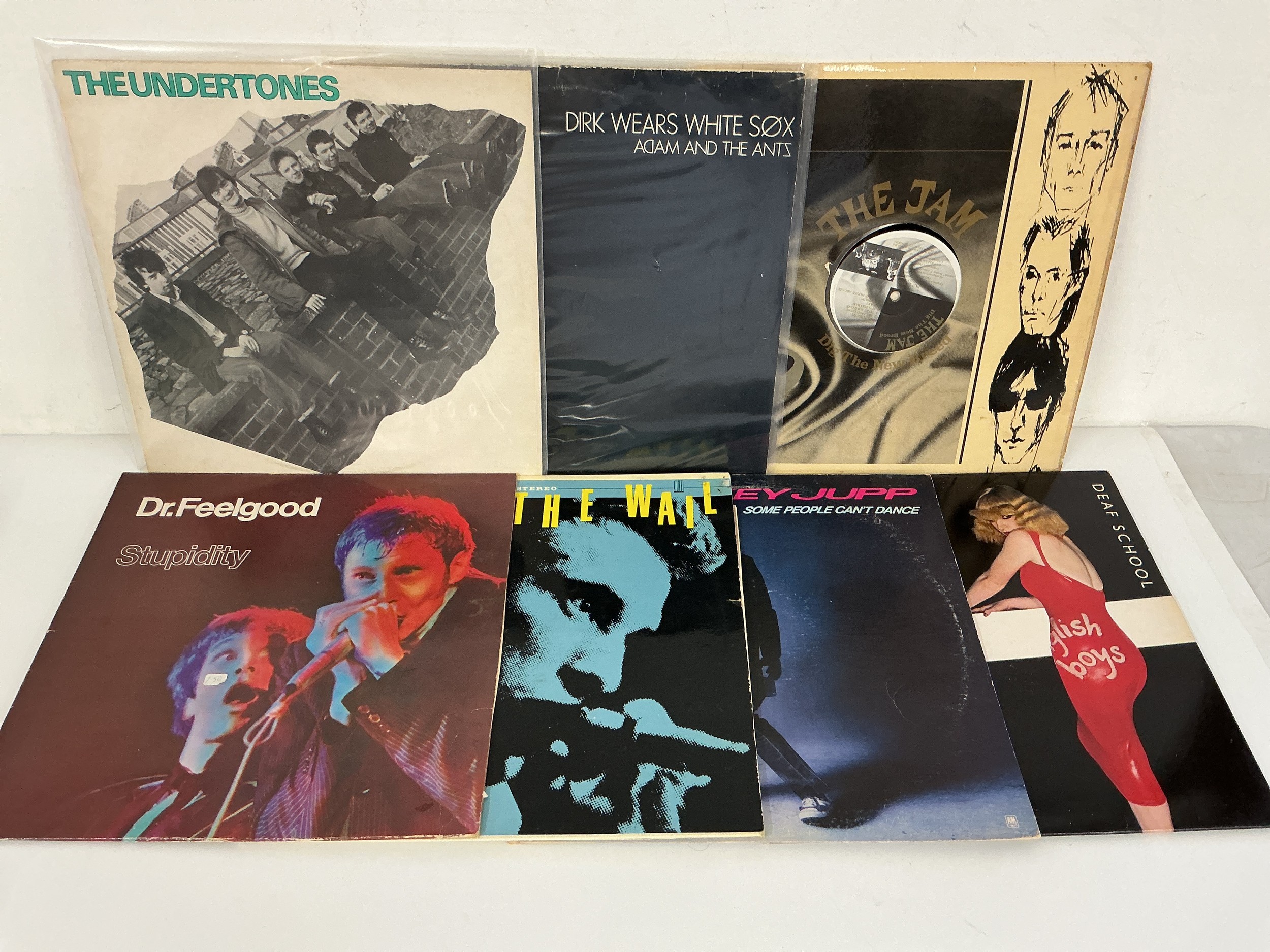 Fourteen punk, pub rock and new wave LPs and 12" singles by various artists including The Undertones, The Jam, Dr Feelgood and others.
