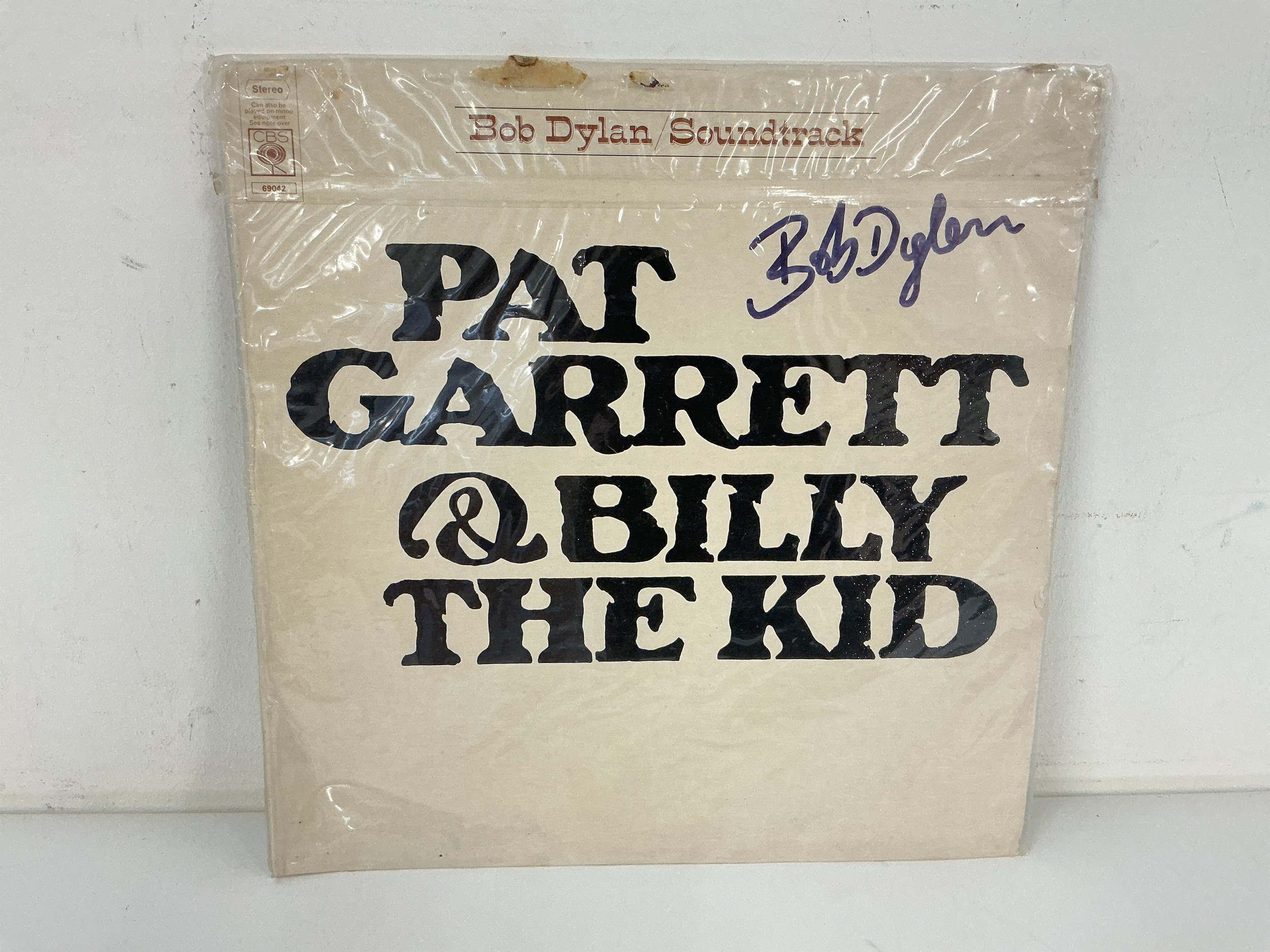 A signed Bob Dylan Pat Garrett & Billy The Kid LP with COA.