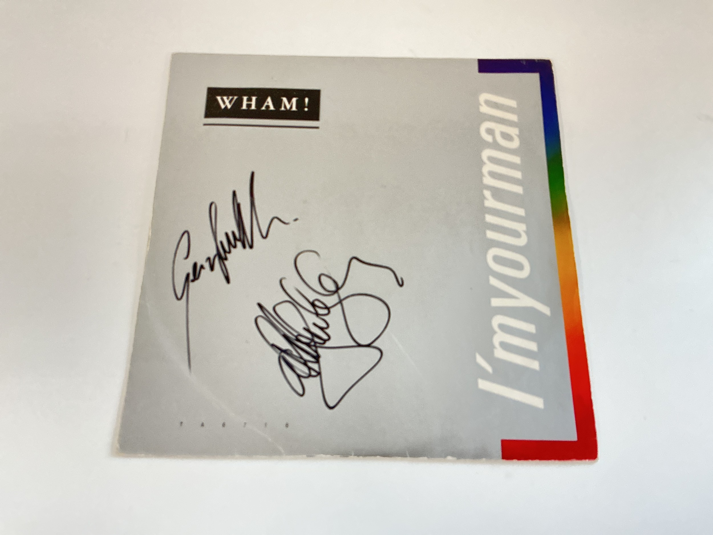 A signed Wham! I'm Your Man 12" single. Comes with COA.