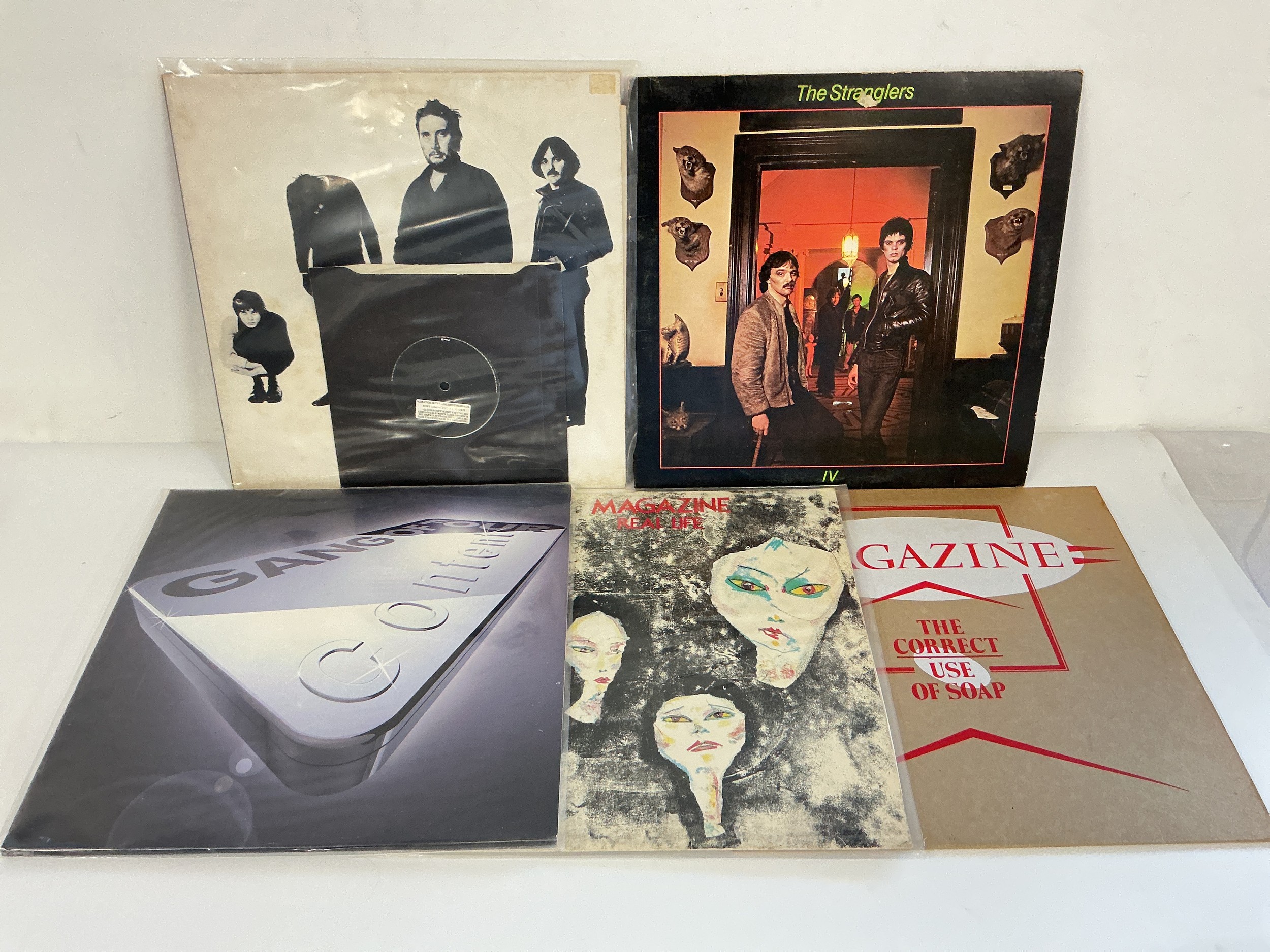 Eleven punk LPs and 12" singles by various artists including The Stranglers, Buzzcocks, Magazine and others.