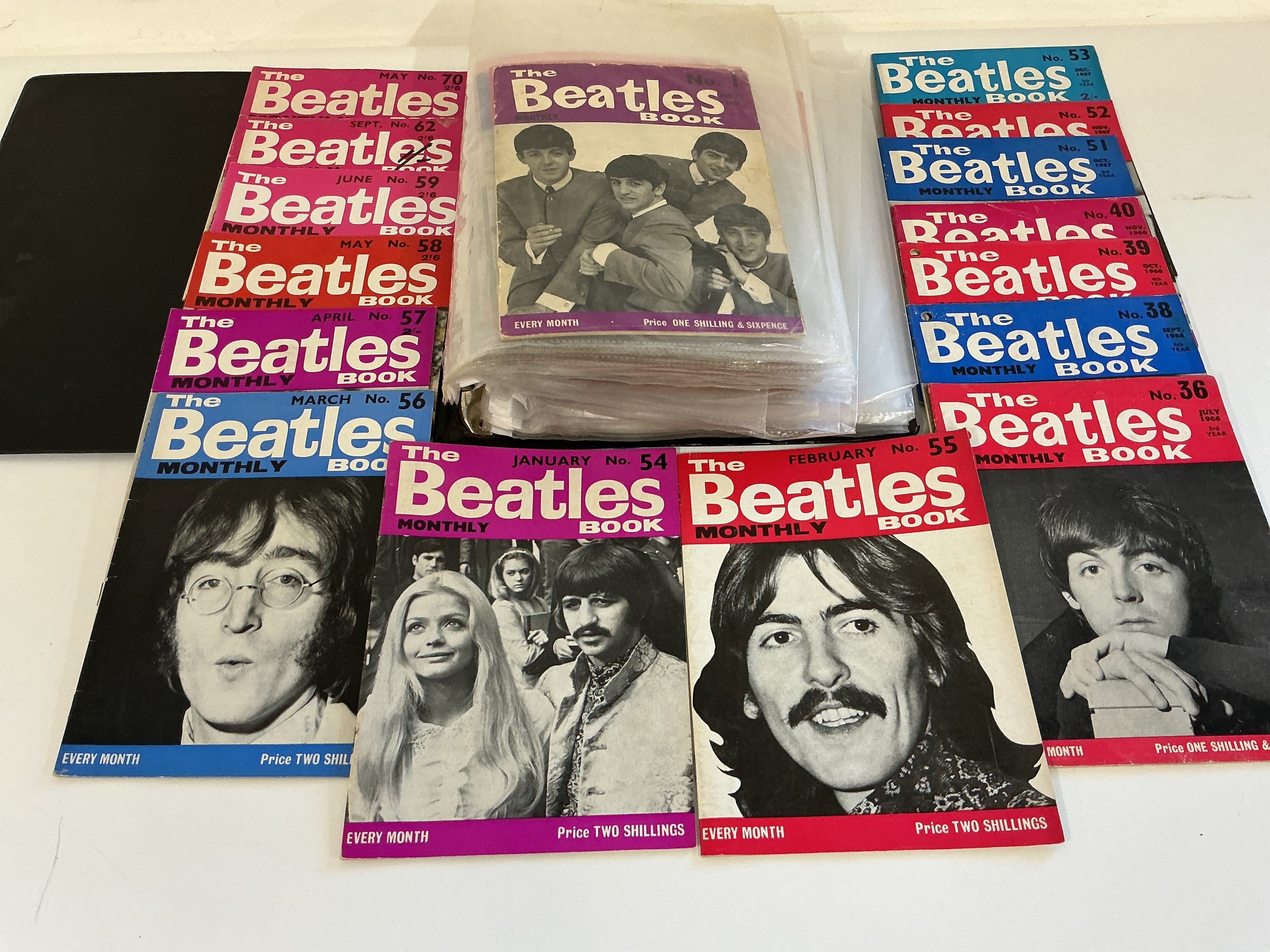 A collection of Beatles Book Monthly magazines comprising issues 1-36, 38-40, 51-59, 62 and 70. Also includes some Beatles ephemera including a Royal Command Performance magazine, In His Own Write book etc.