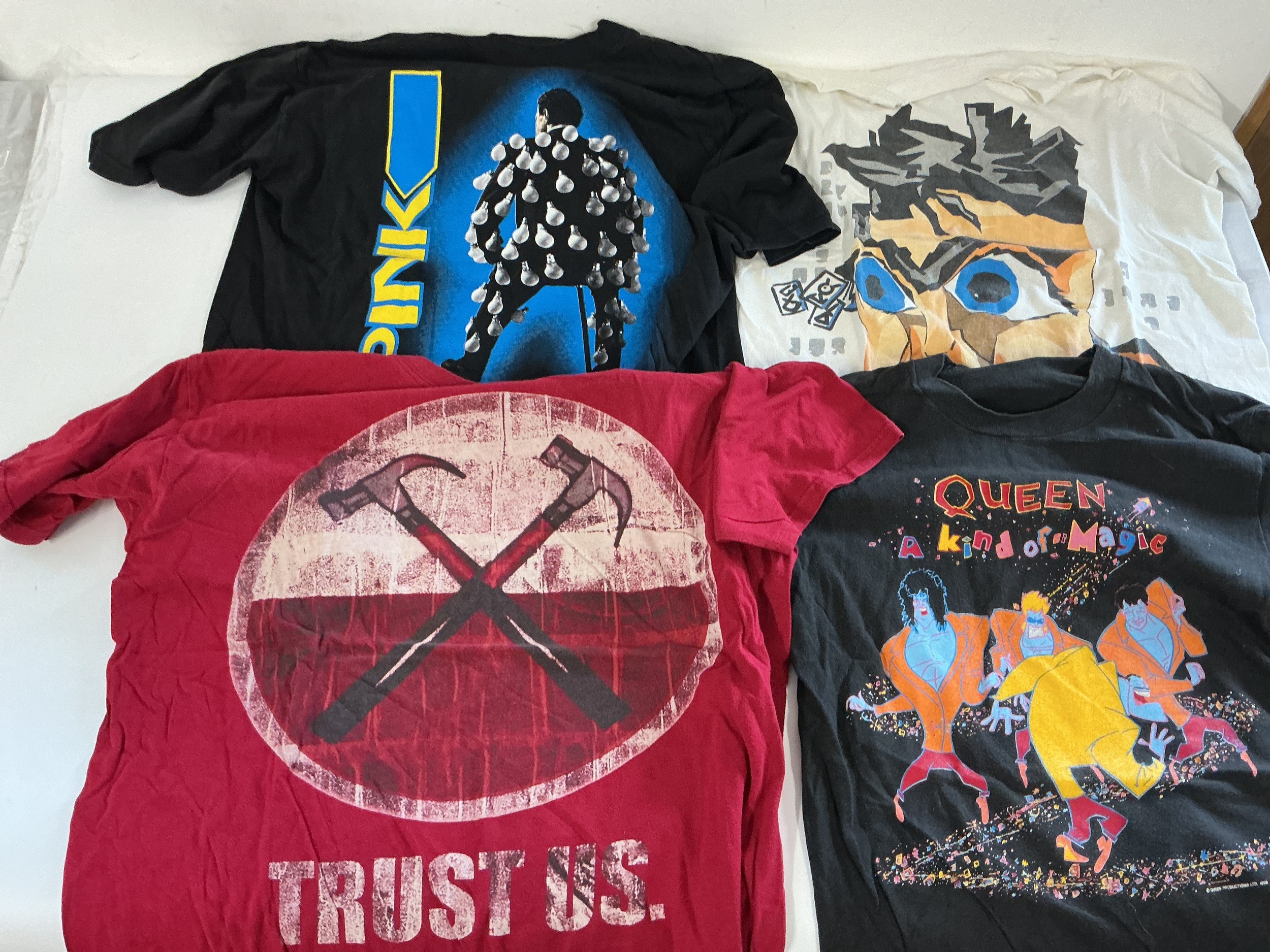 A collection of band tour T shirts for various artists including Pink Floyd, Queen, Rush and others. Please see images for list.