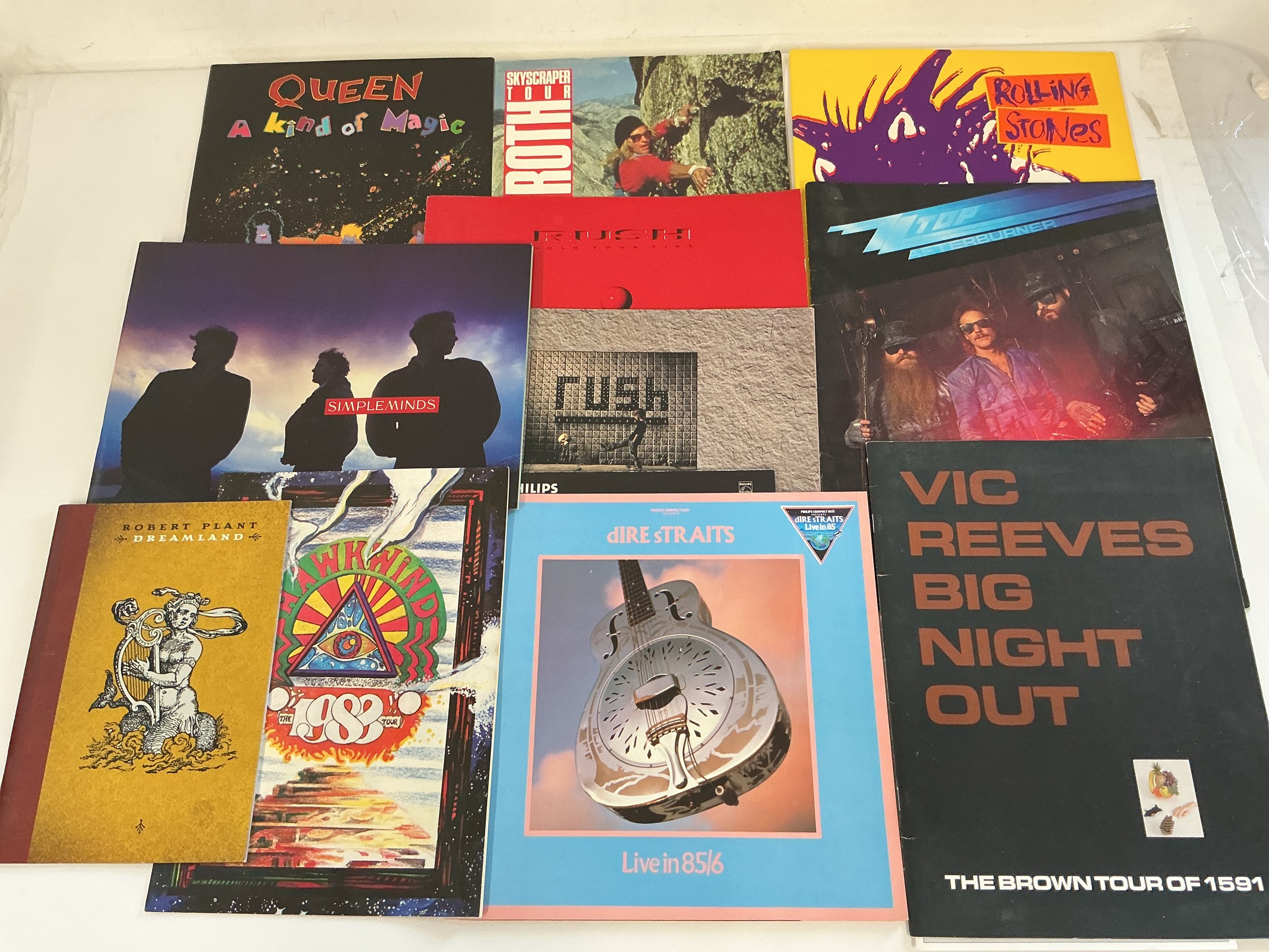 Eighteen various tour programs for various artists including Queen, Hawkwind, Rolling Stones and others.