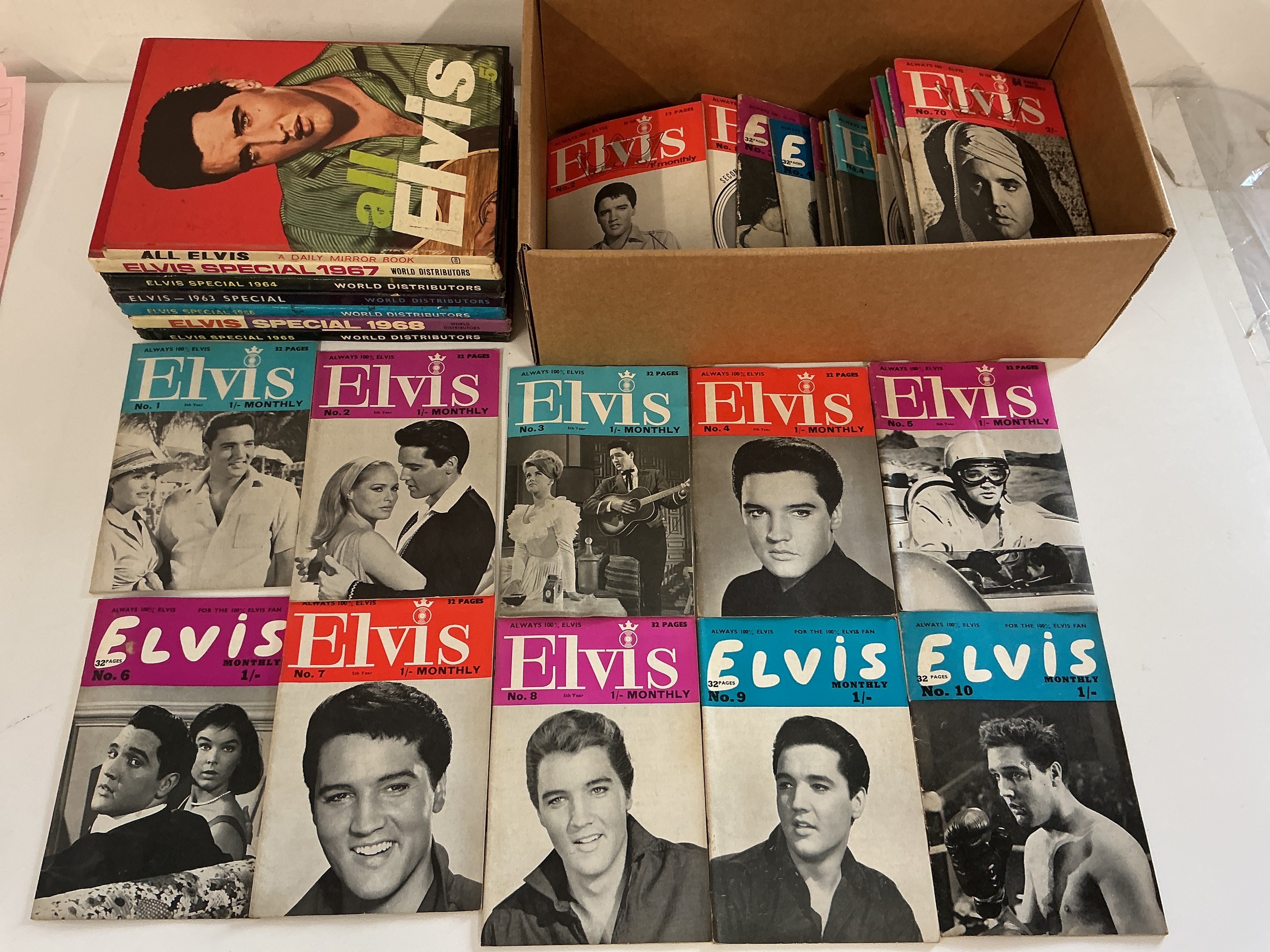 A collection of Elvis Monthly magazines and annuals plus scrapbooks etc.
