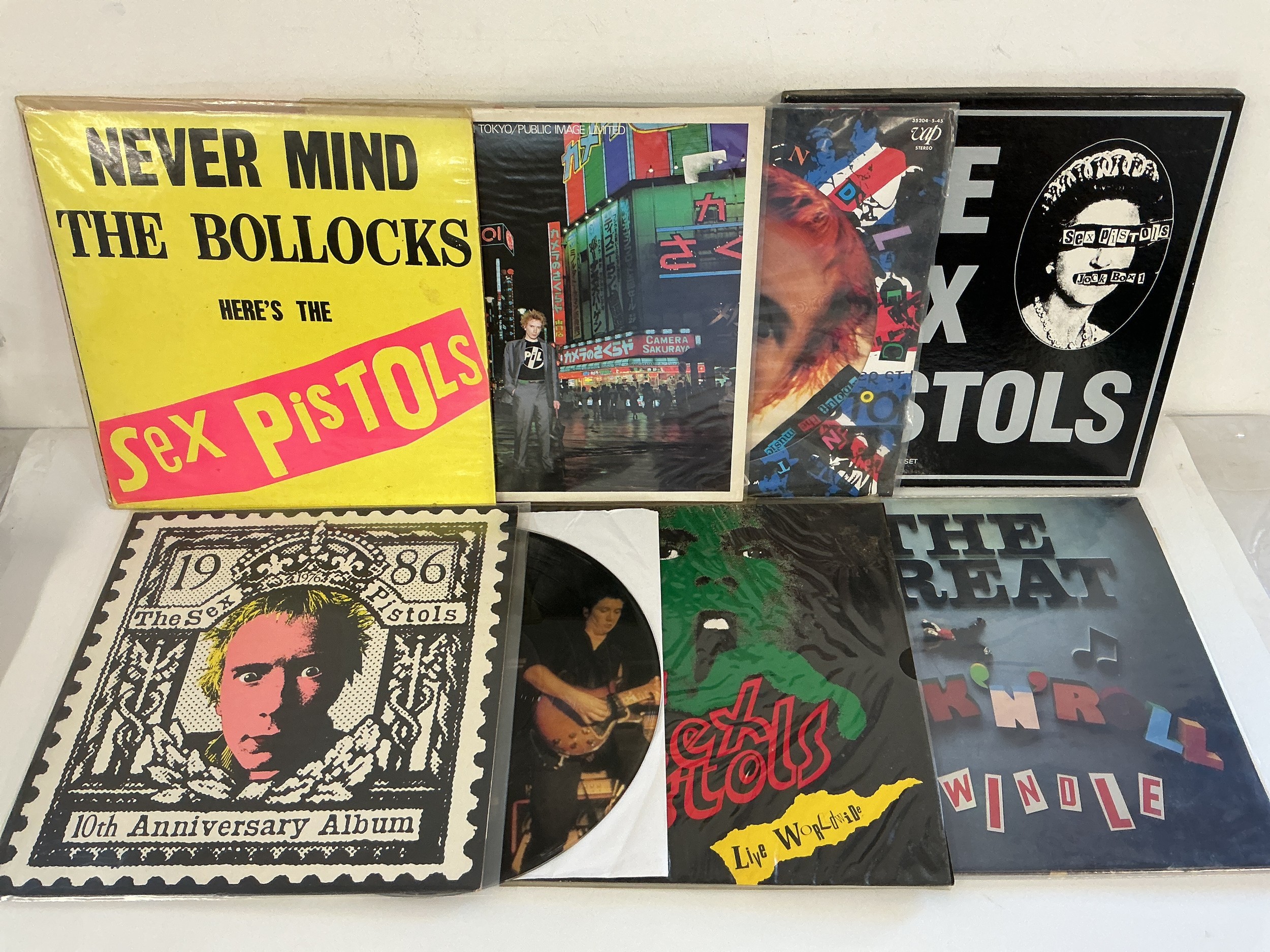Eight Sex Pistols and related LPs comprising Never Mind The Bollocks (1985 repress), PiL Live In Tokyo, The Great Rock n Roll Swindle and others.
