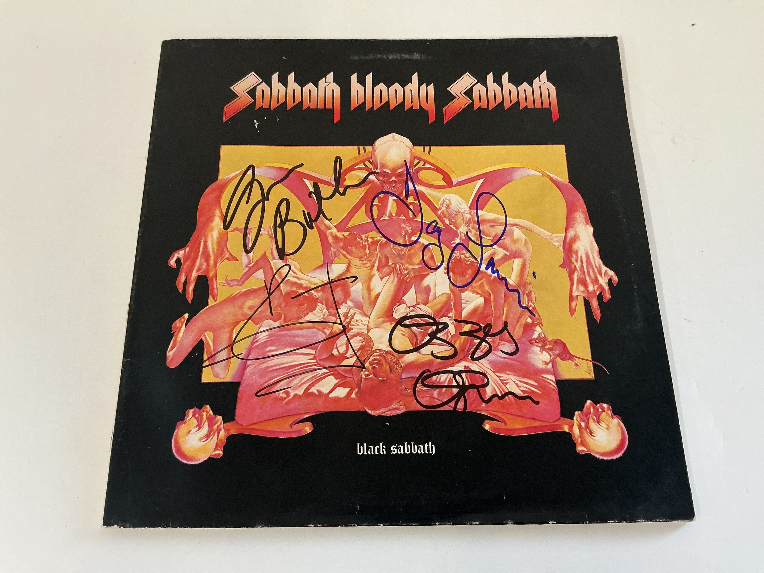 A signed Black Sabbath - Sabbath Bloody Sabbath LP bearing all four original members signatures. No COA.