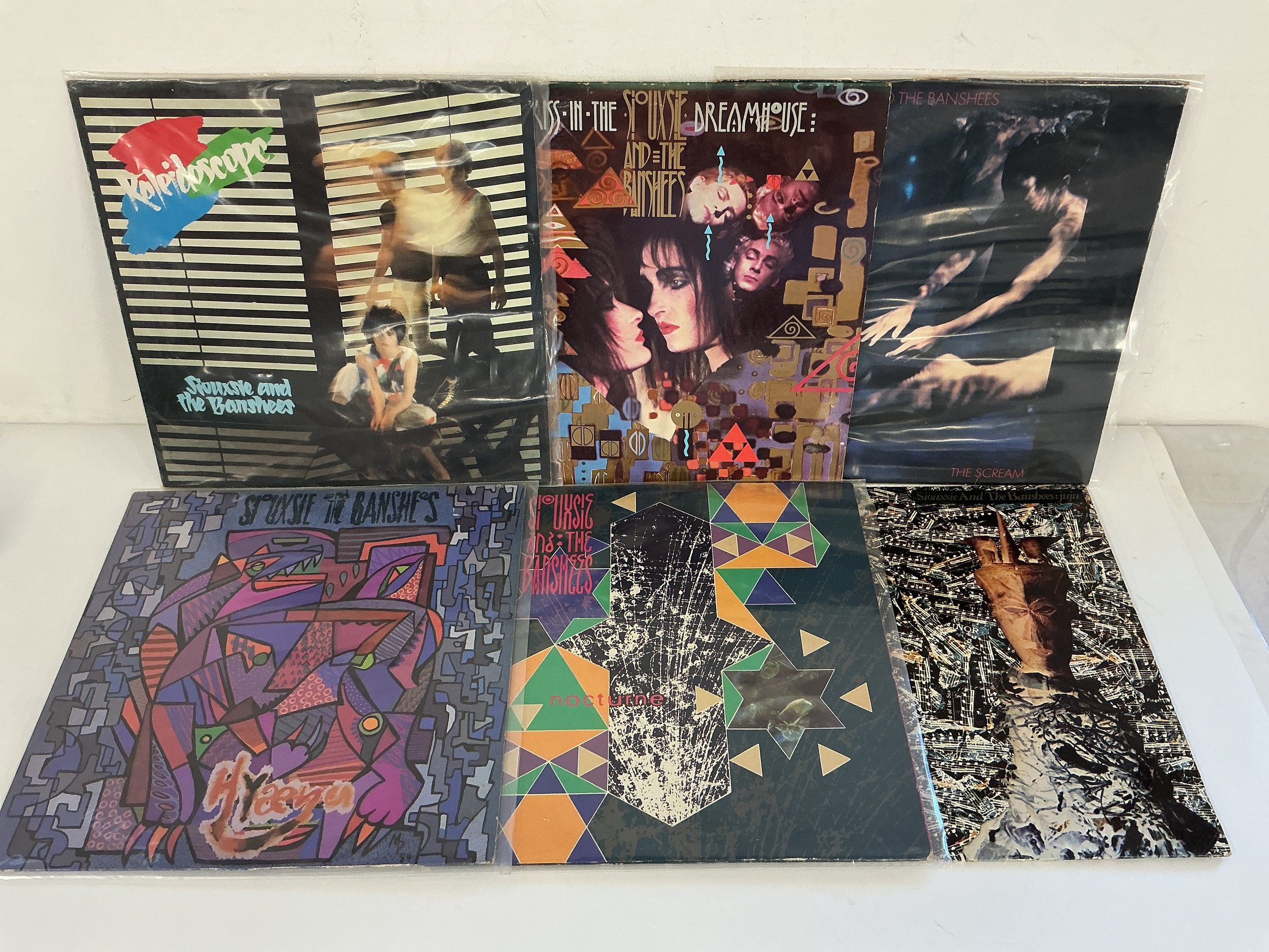 Eleven Siouxsie & The Banshees LPs and 12" singles including Kaleidoscope, A Kiss In The Dreamhouse, Juju and others.