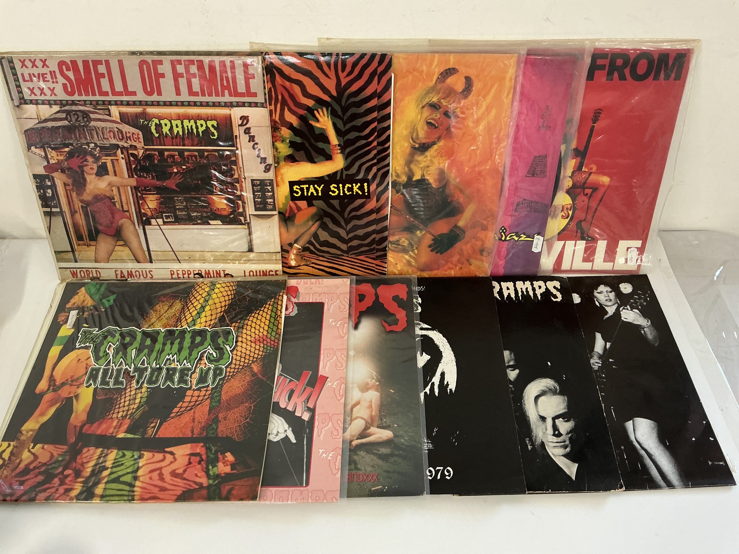 Eleven LPs by The Cramps comprising Smell Of Female, A Date With Elvis, Big Beat From Badsville and others.