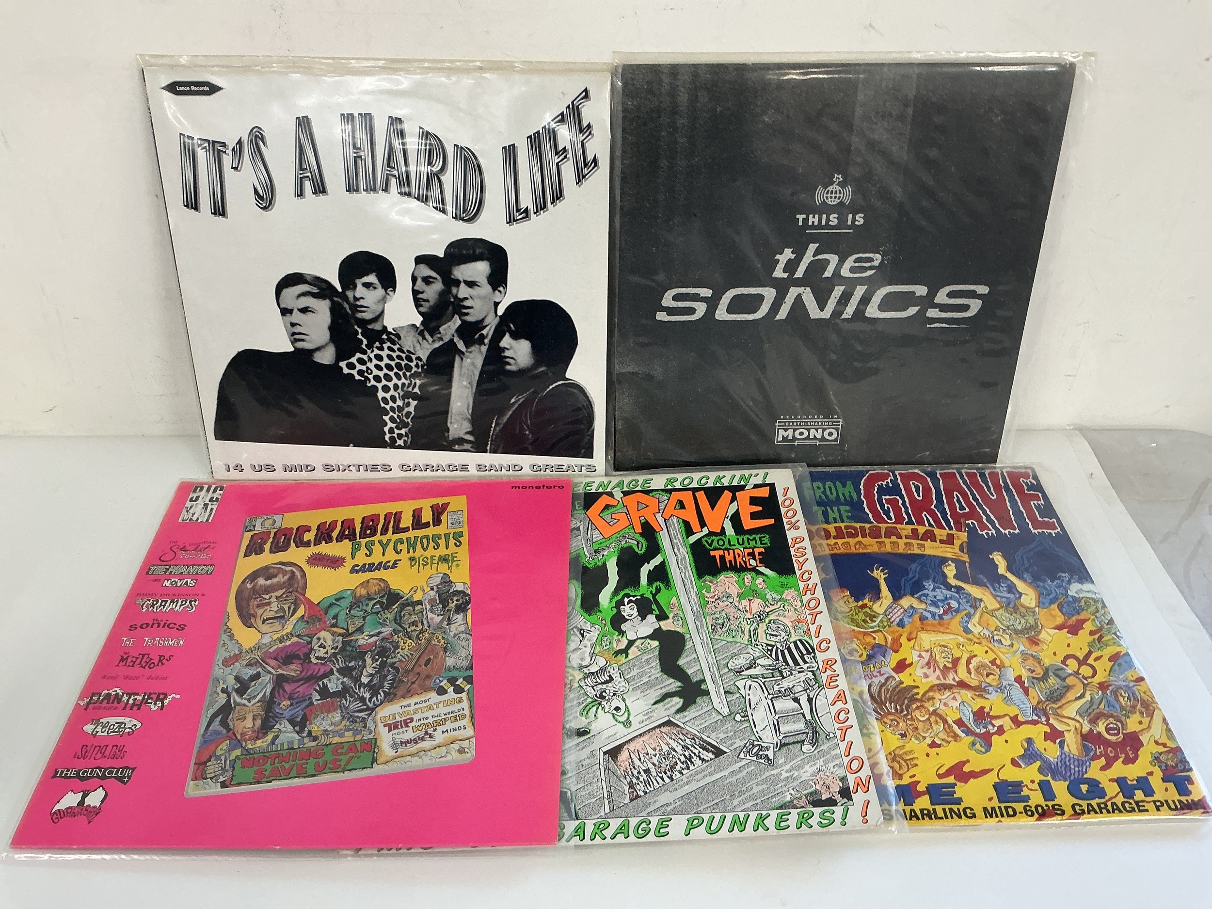 Five psychobilly and 60s garage punk LPs.