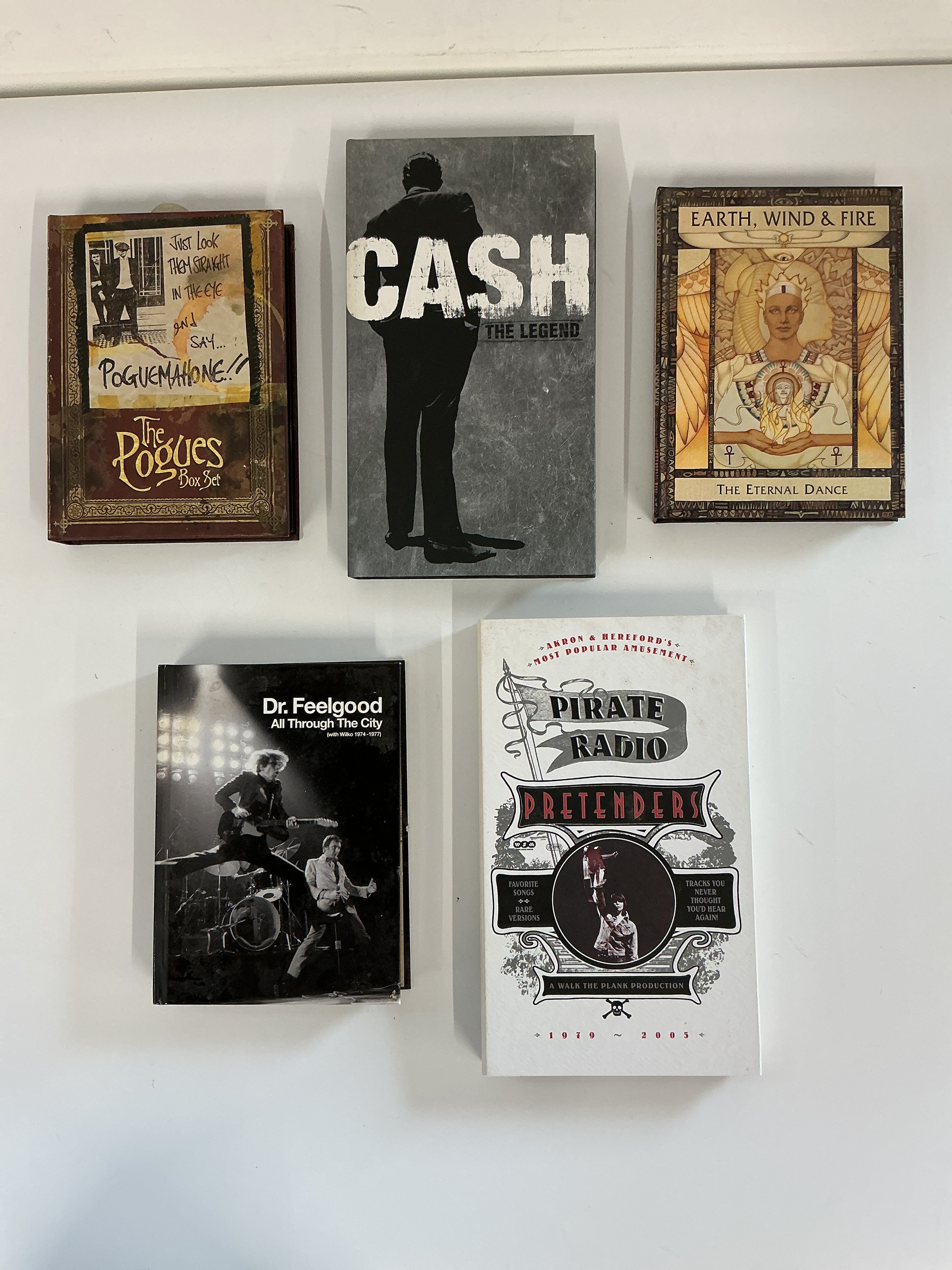Five CD box sets by various artists including The Pogues, Johnny Cash and others. Please note there are discs missing from the Dr Feelgood and Pretenders box sets.