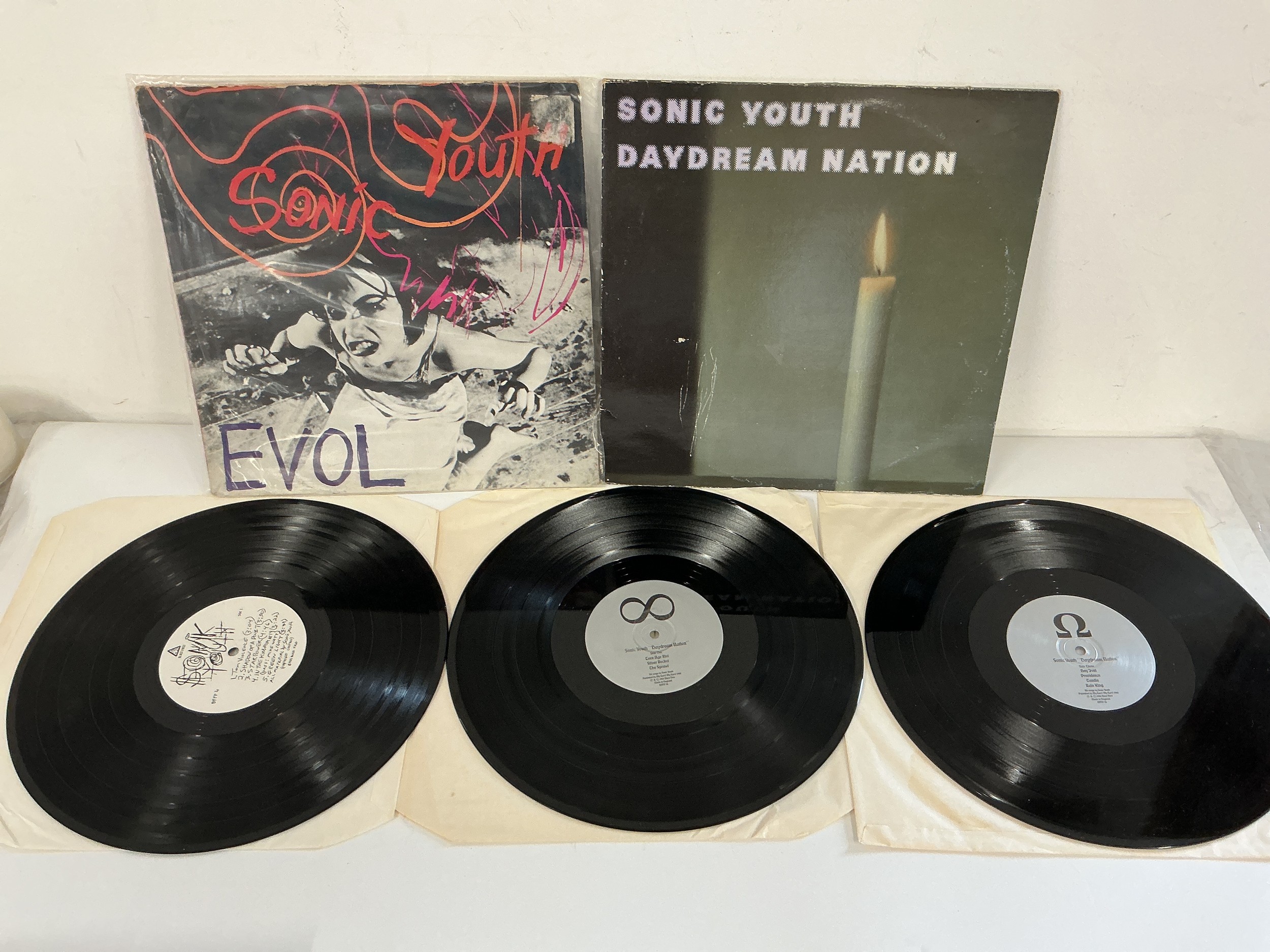 Two early UK pressings of Sonic Youth LPs comprising Daydream Nation and Evol. No inserts. Vinyl EX, sleeves G/VG.