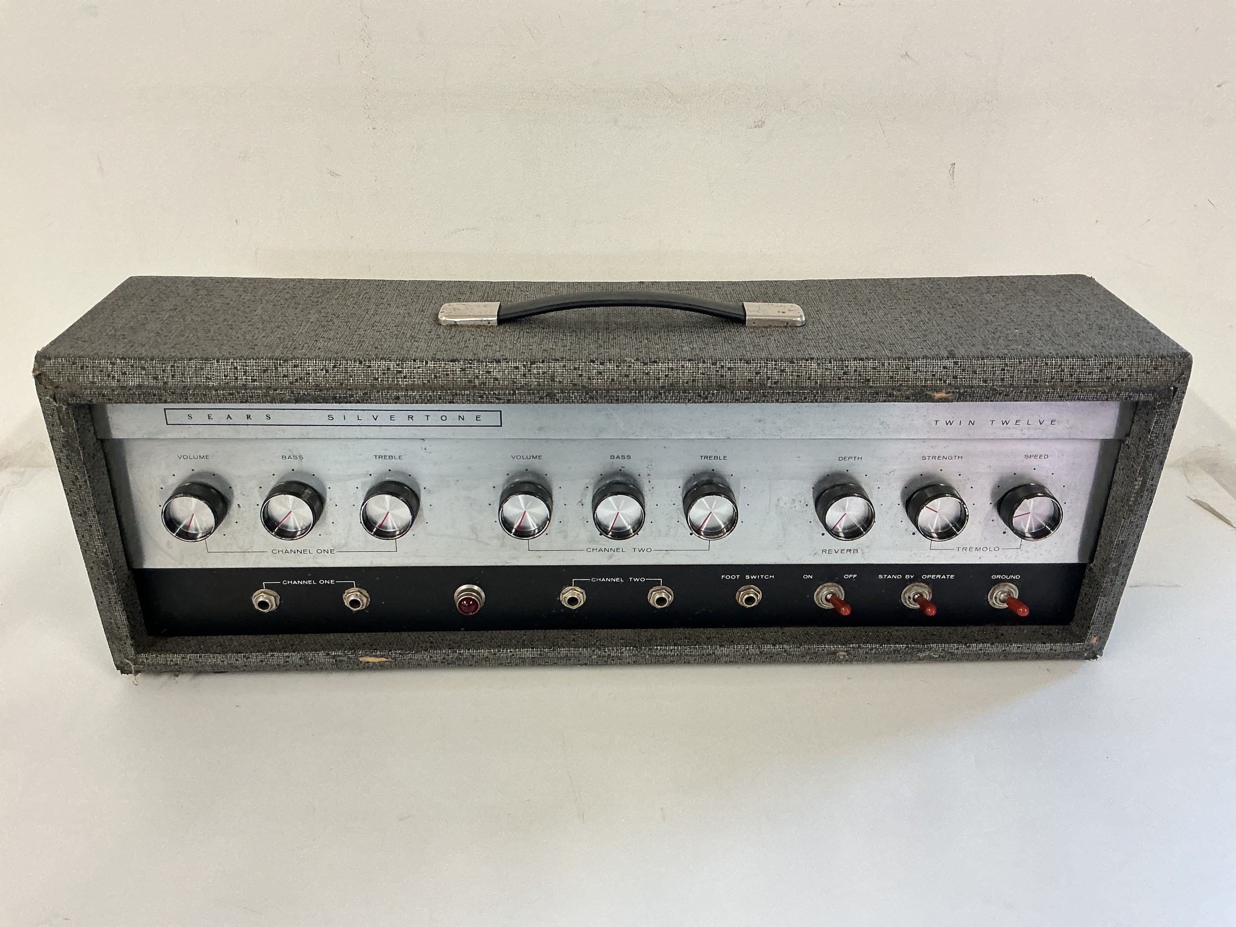 A rare US made Sears Silvertone Twin Twelve amp head.