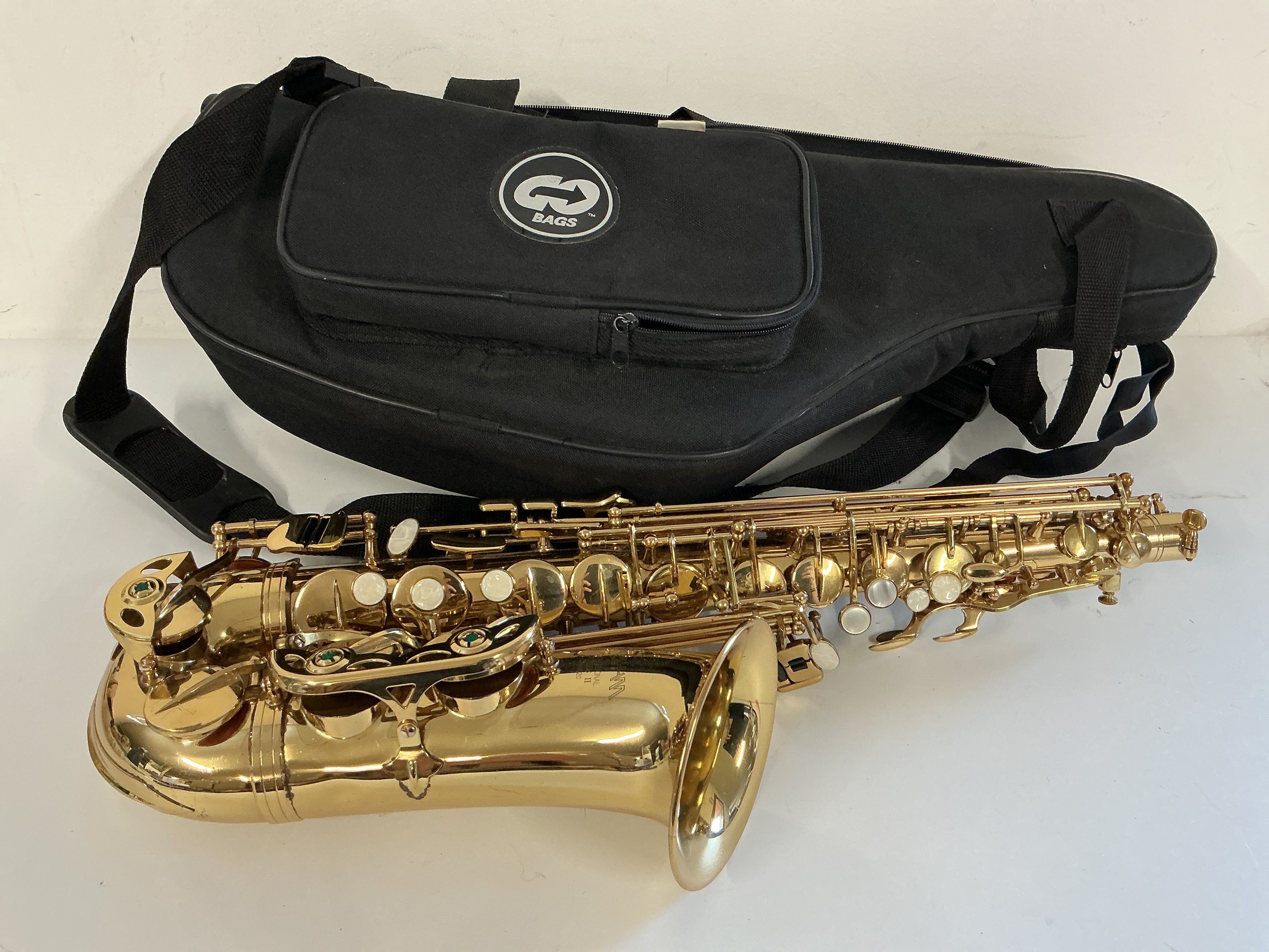 An Earlham Professional Series 2 alto saxophone. No mouthpiece and needs new pads. Comes with a soft carry case.