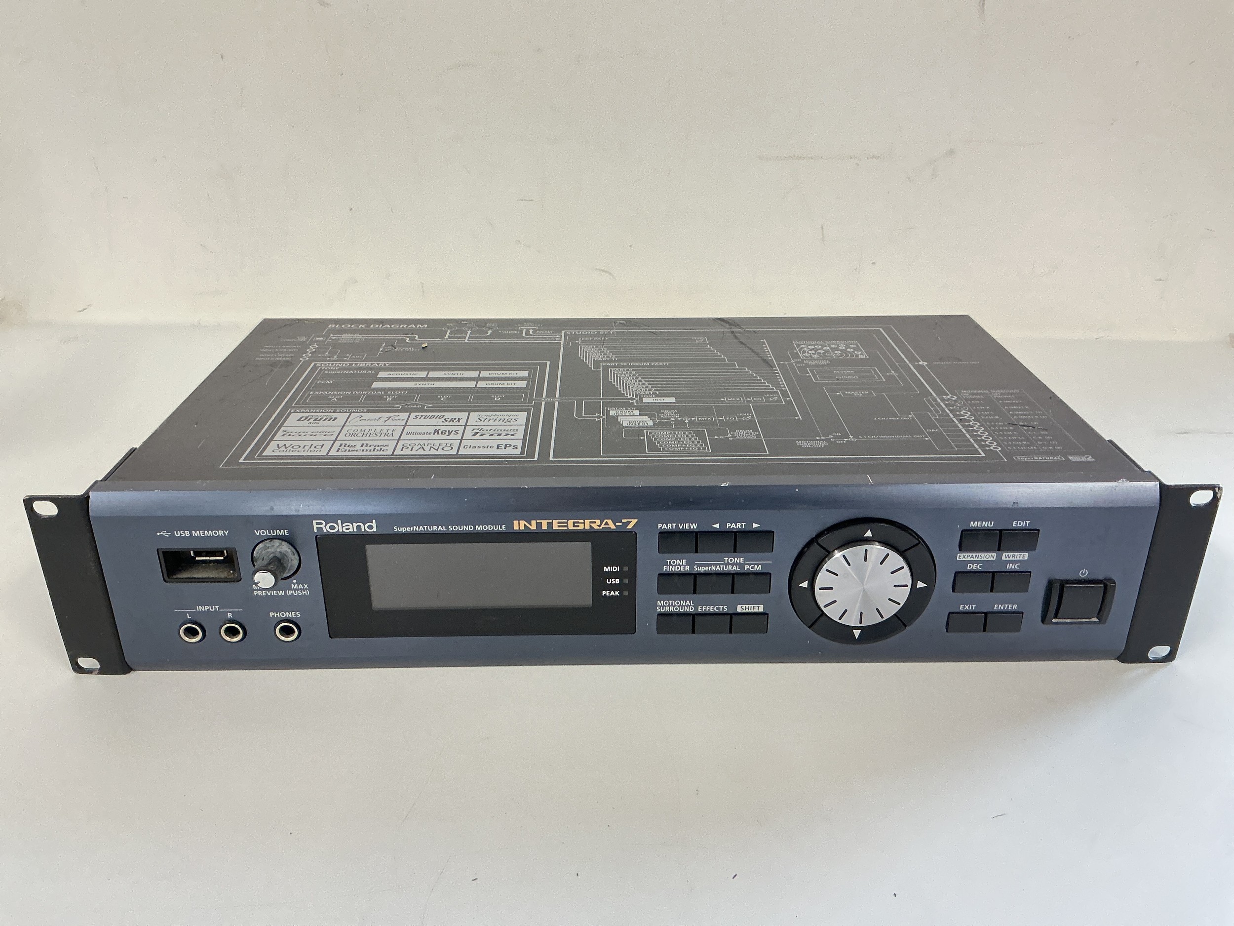A Roland Integra 7 synthesizer sound module.