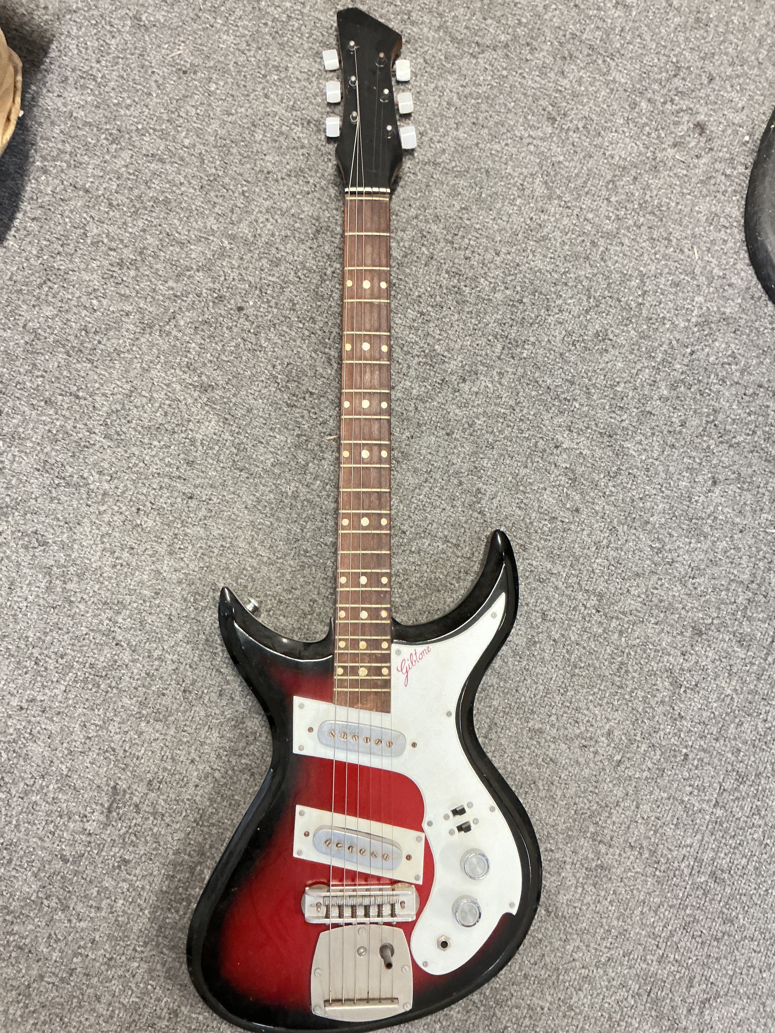 An Indian made Gibtone electric guitar, no case.
