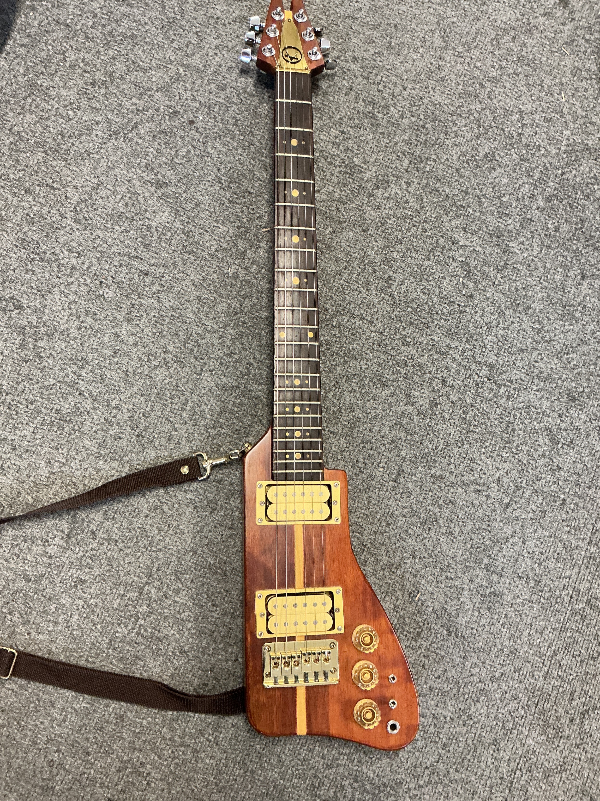 A Kay Rifle K45 electric guitar. Comes with a soft carry case.