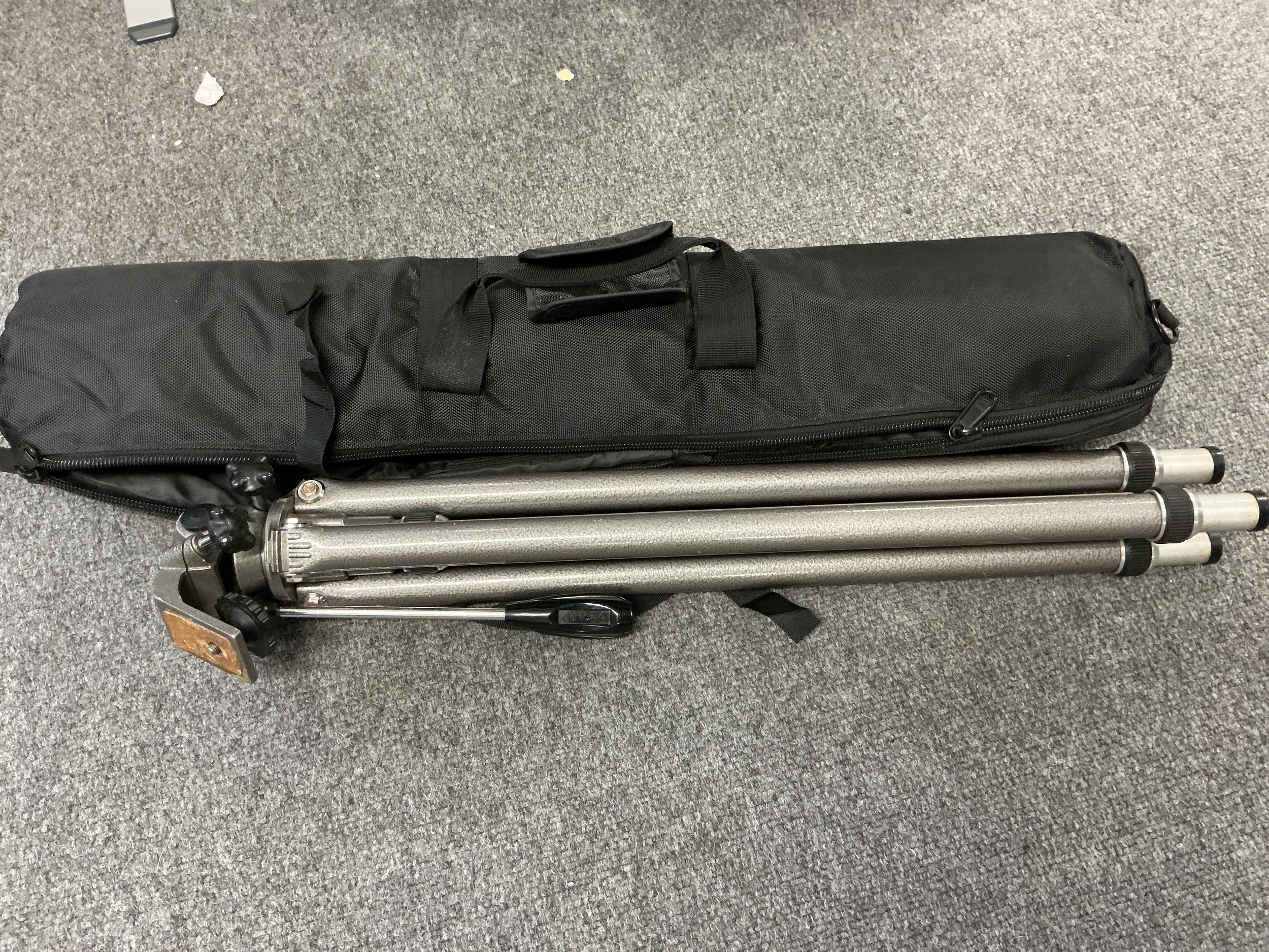 A Gitza professional tripod stand with carry case.