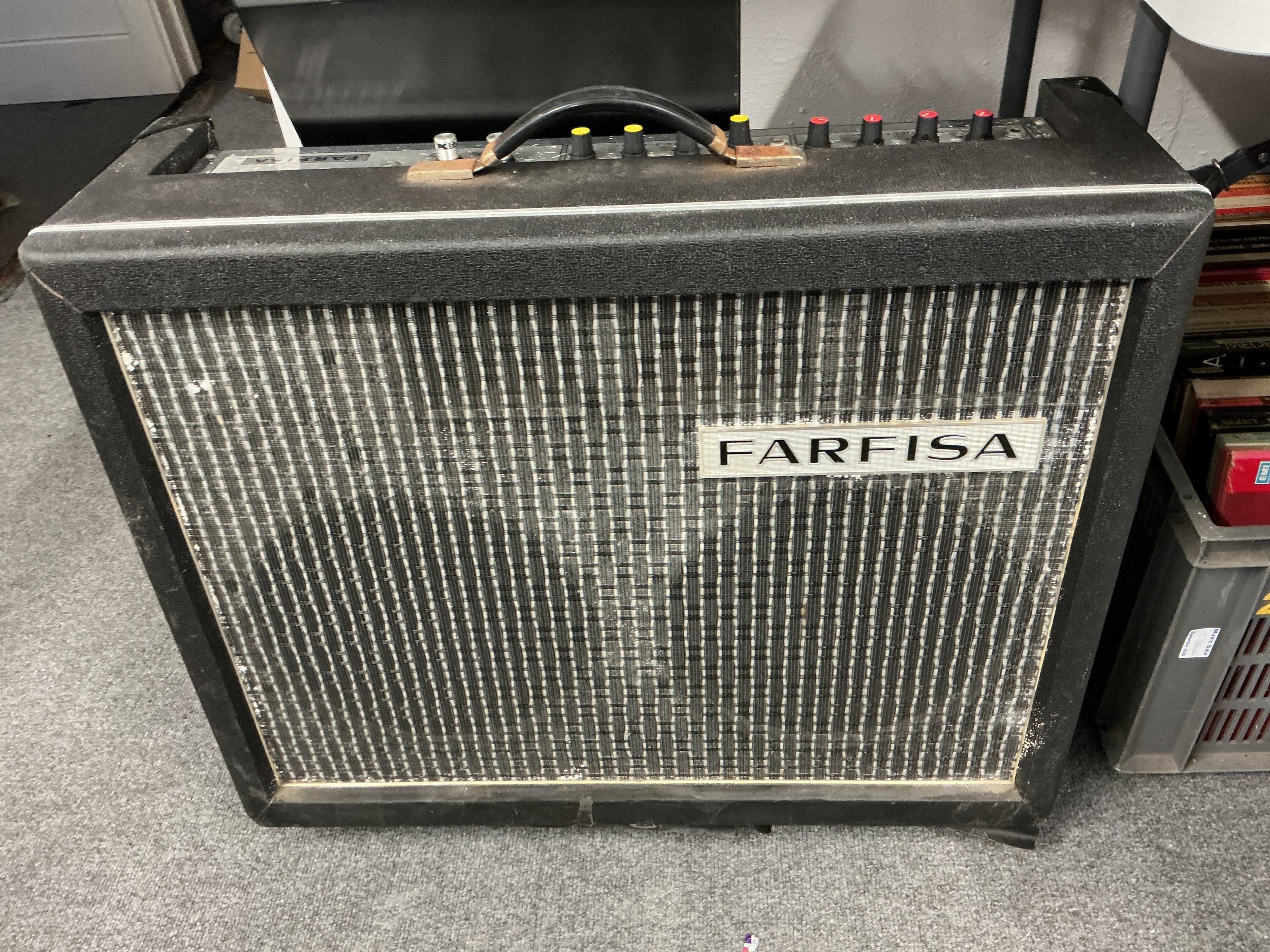 A Farfisa TR-70 amplifier and cover.
