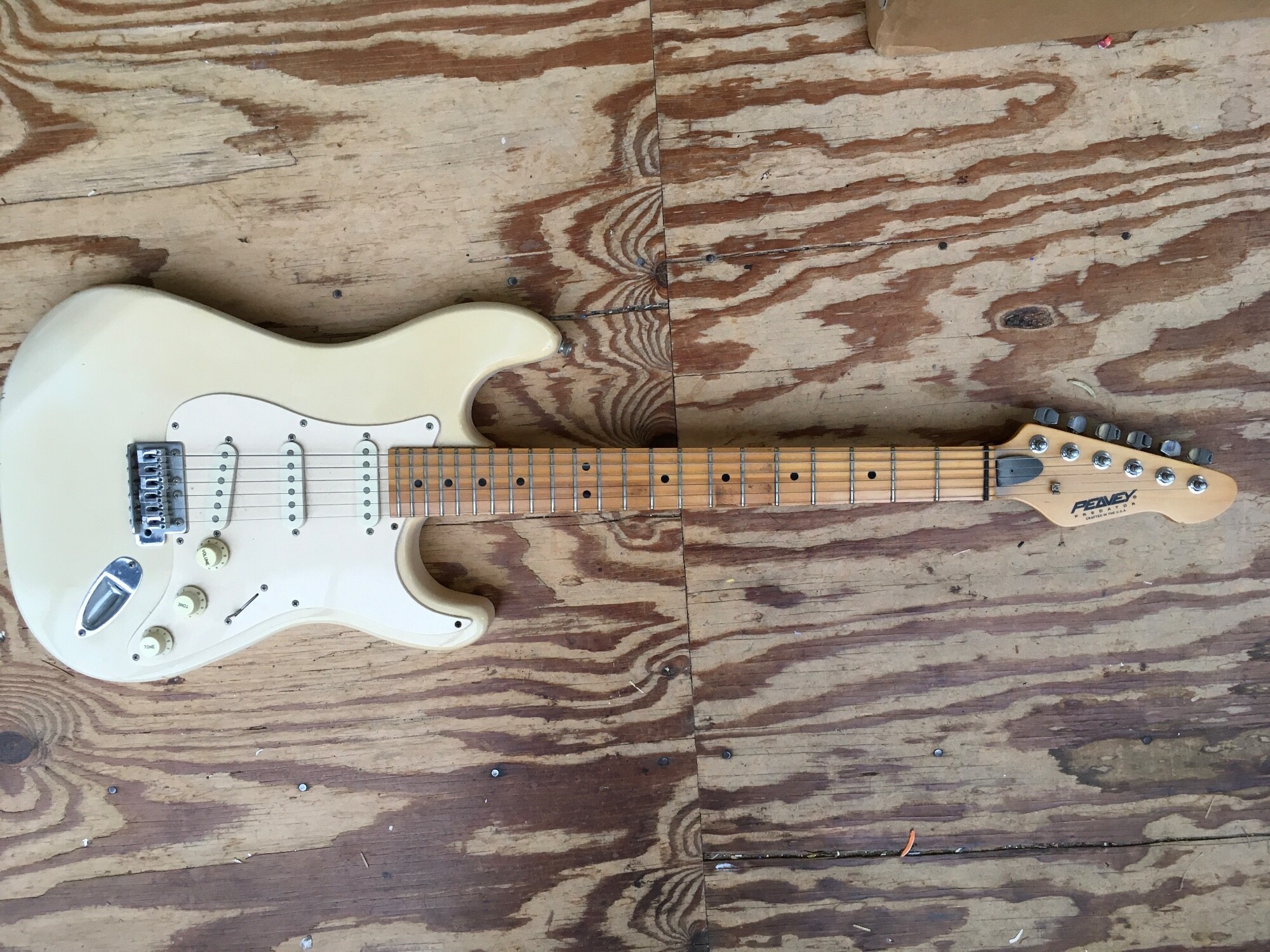 A Peavey Predator electric guitar, no case.