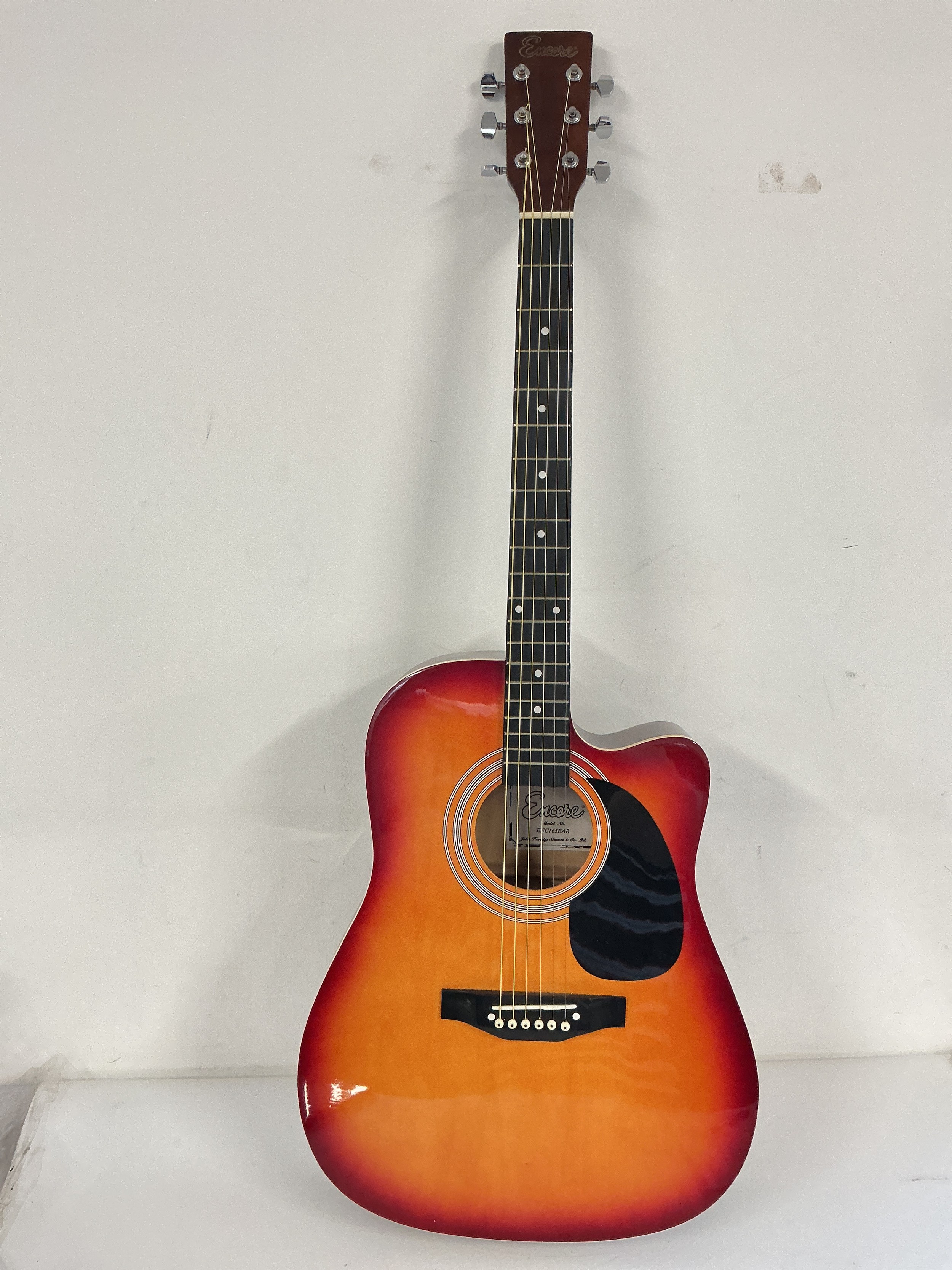 An Encore ENC165EAR semi acoustic guitar, no case.