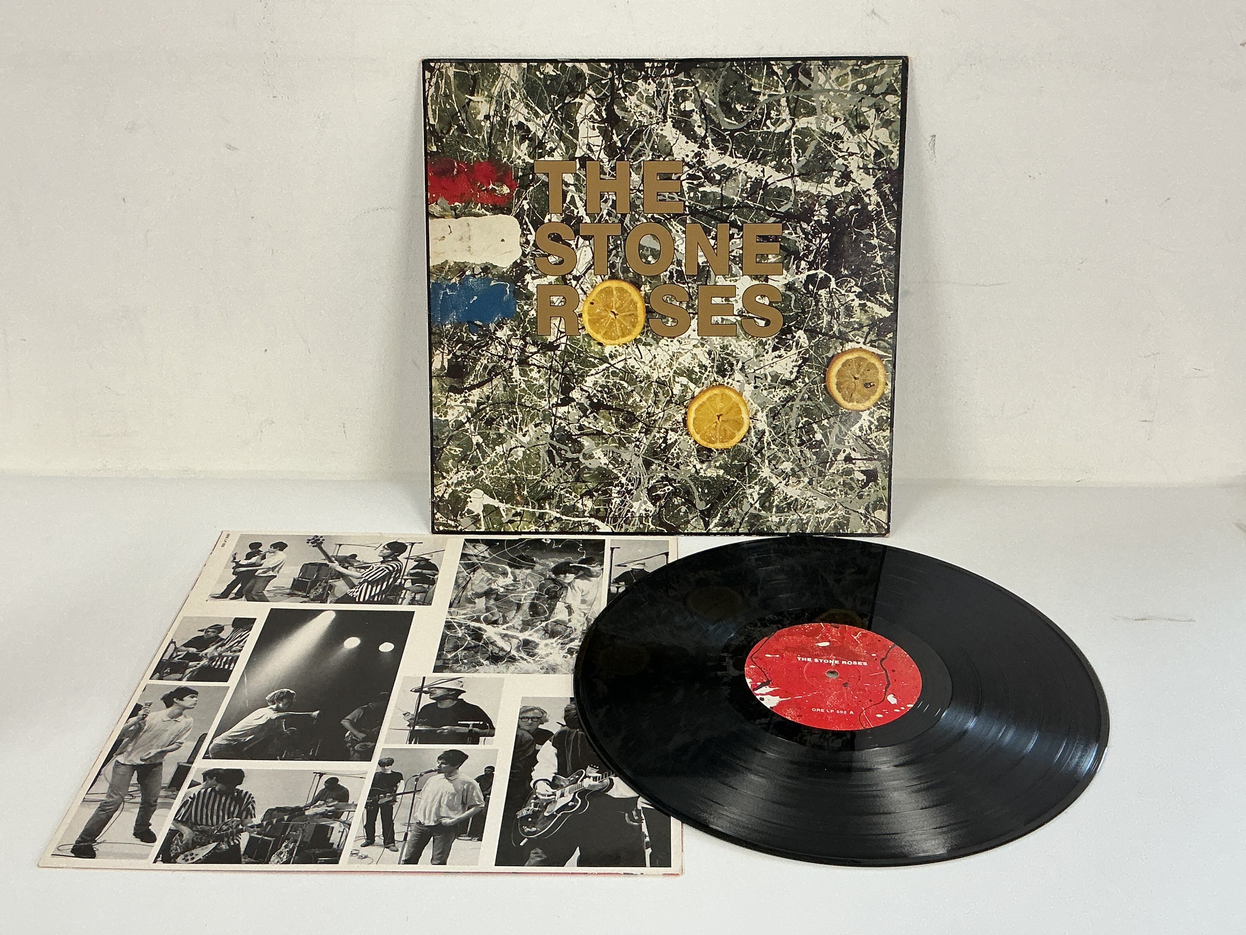 A first UK pressing of The Stone Roses self titled debut LP, non embossed sleeve. Vinyl EX, sleeve VG+.
