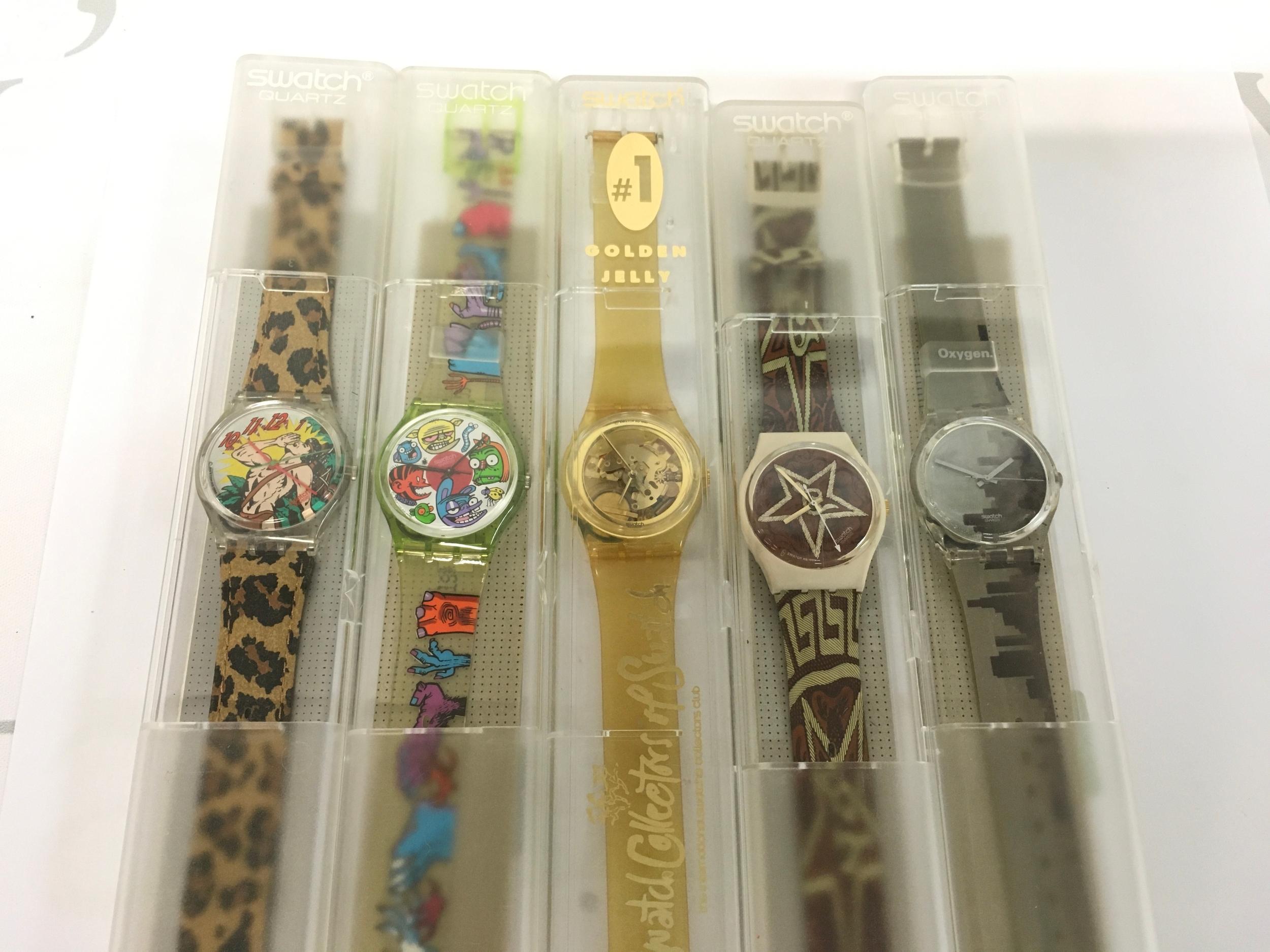 collection of five vintage Swatch watches from the 1990s includes specialised artist designs and themed models