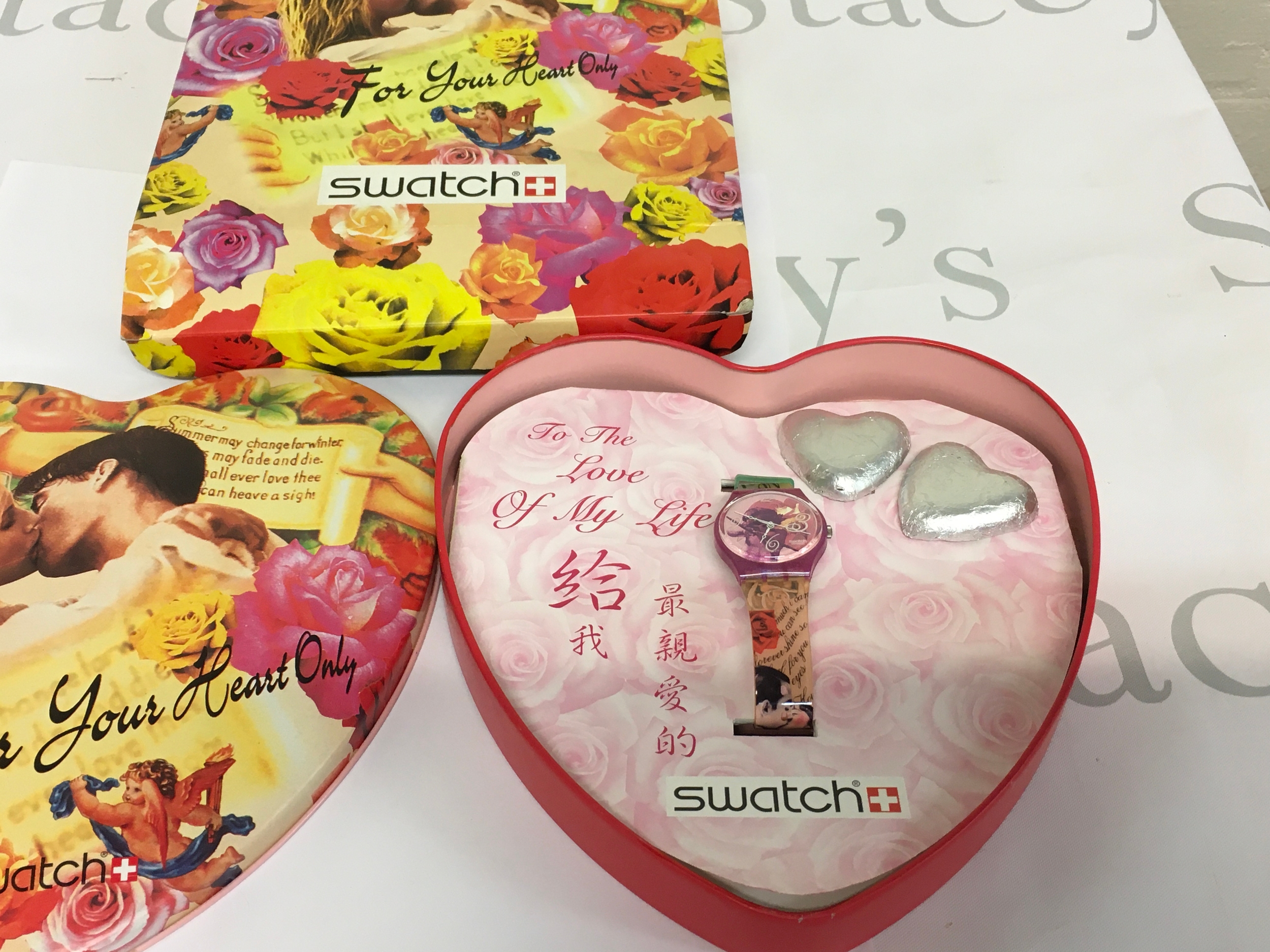 Swatch Gent "For Your Heart Only" watch set featuring a heart-shaped tin with themed chocolates. Swatch Gent GR127 "For Your Heart Only," released as a Valentine's Day special in 1995.