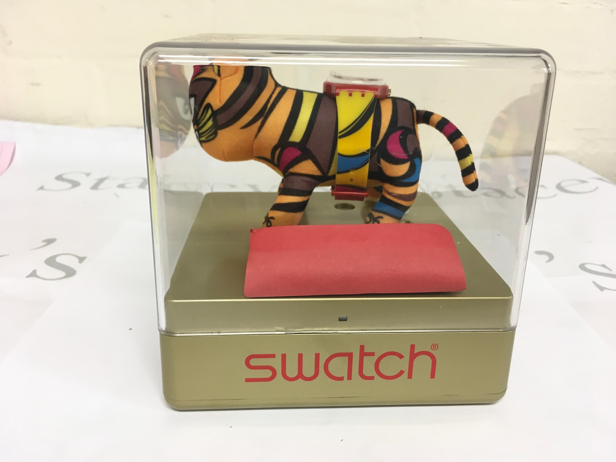 2010 Swatch Chinese New Year Special "Year of the Tiger" (The Blessing Sign). It is a limited edition collectible featuring a quartz watch (model GR152) presented on a plush 3-D tiger display
