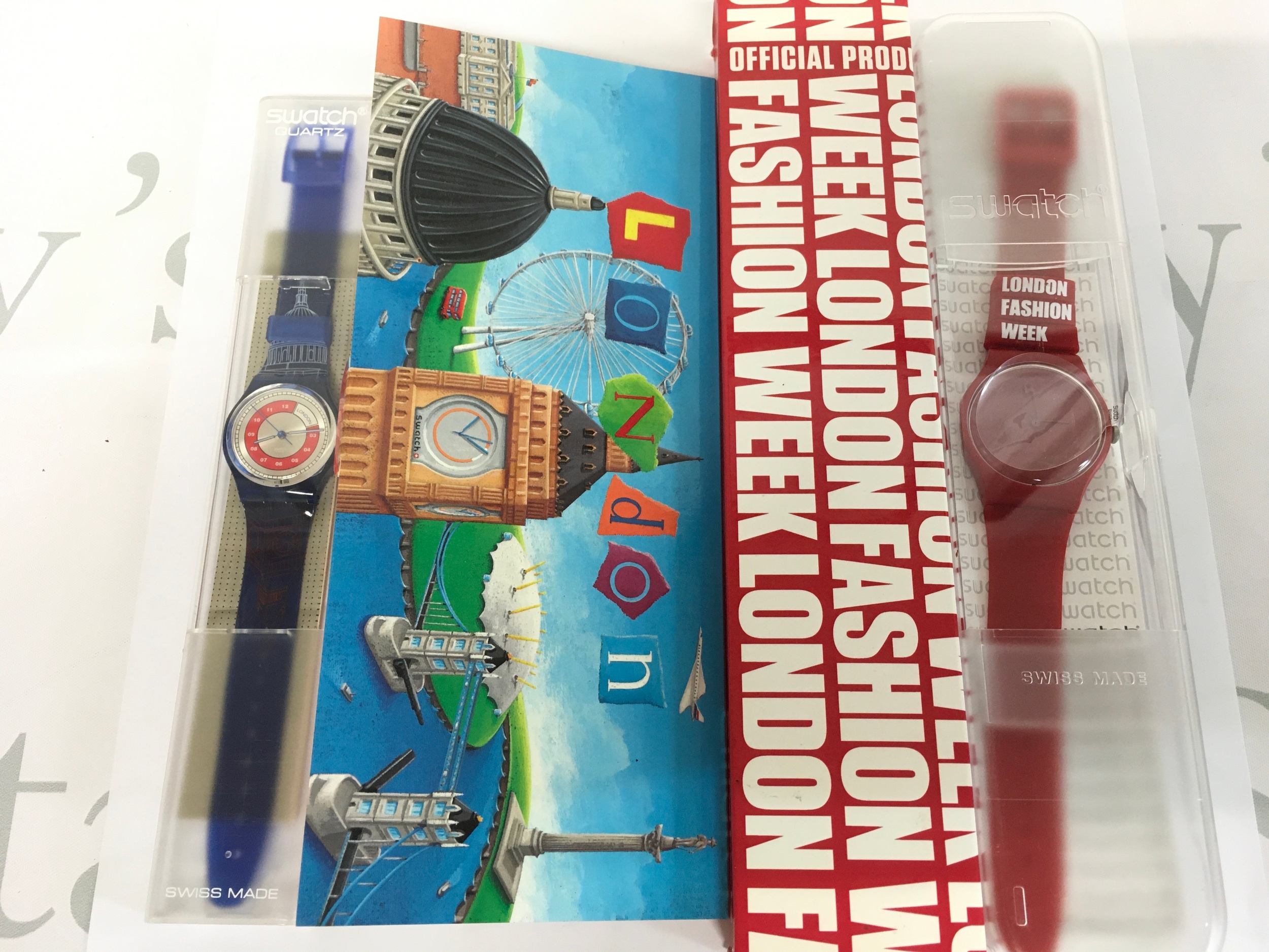Two swatch watches including Swatch Gent "Sightseeing Tour London" (GN190PACK)from the year 2000 and a London fashion week 