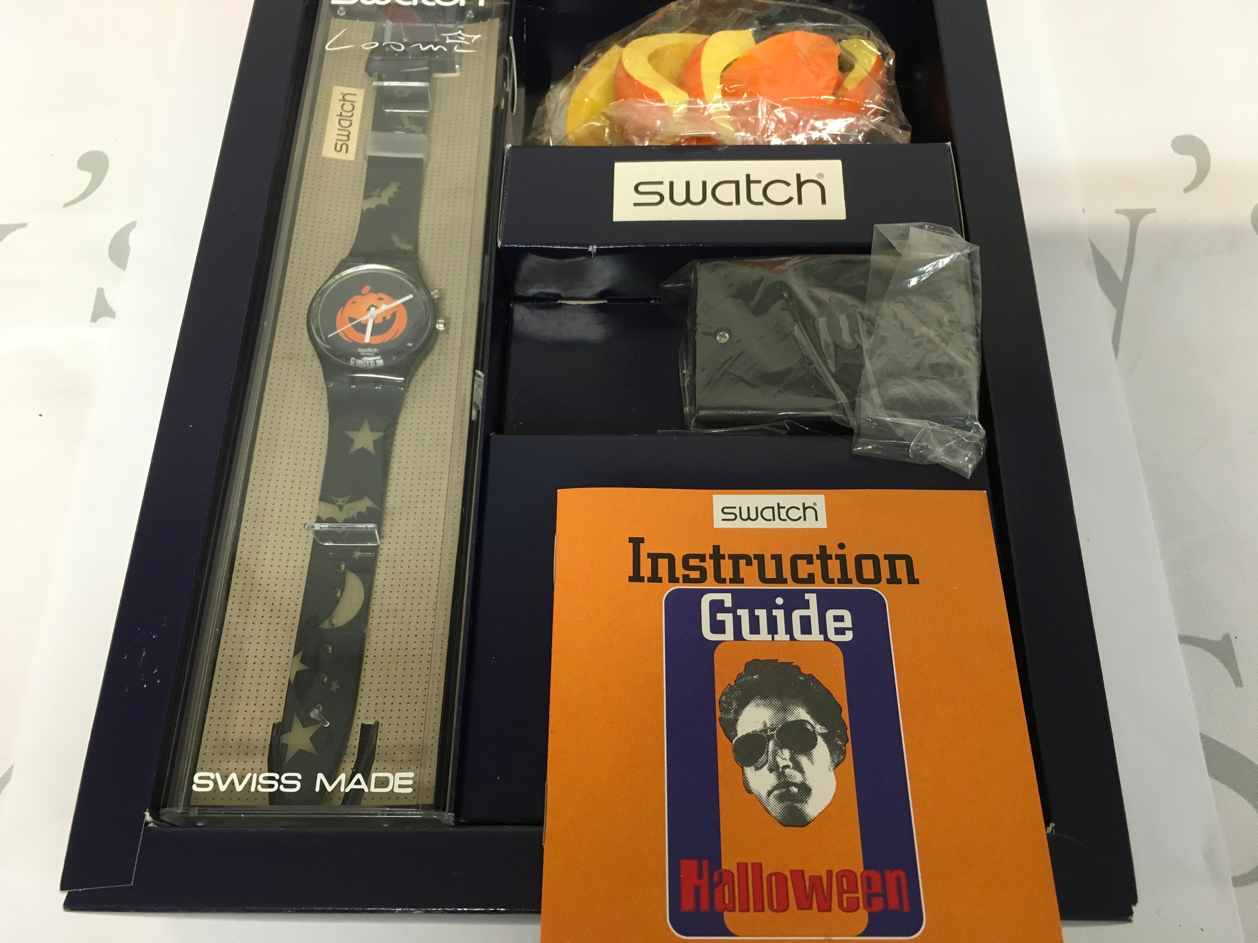 1998 Swatch "Happy Nightmare" Special Edition set, featuring a pumpkin-themed watch and special Halloween packaging