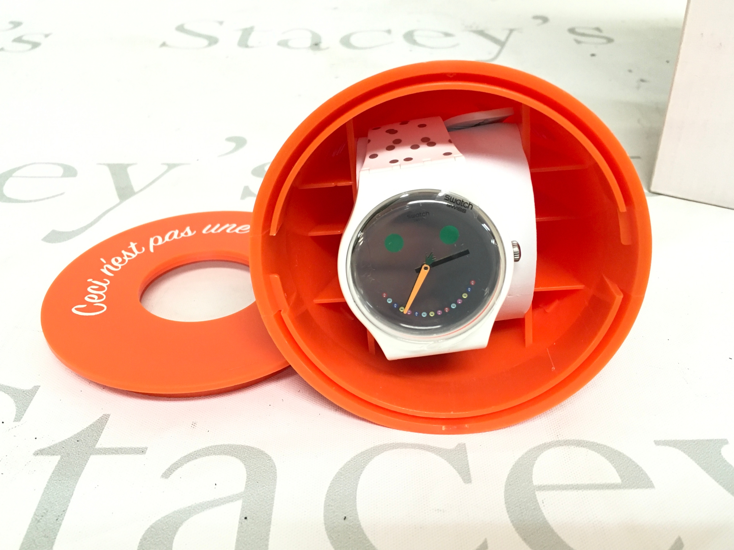 Swatch Isidor SUOZ260S watch features a festive snow-man face on the dial and comes in a unique orange cone-shaped holiday packaging. This 2017 Christmas special release is numbered out of 8,888 pieces.