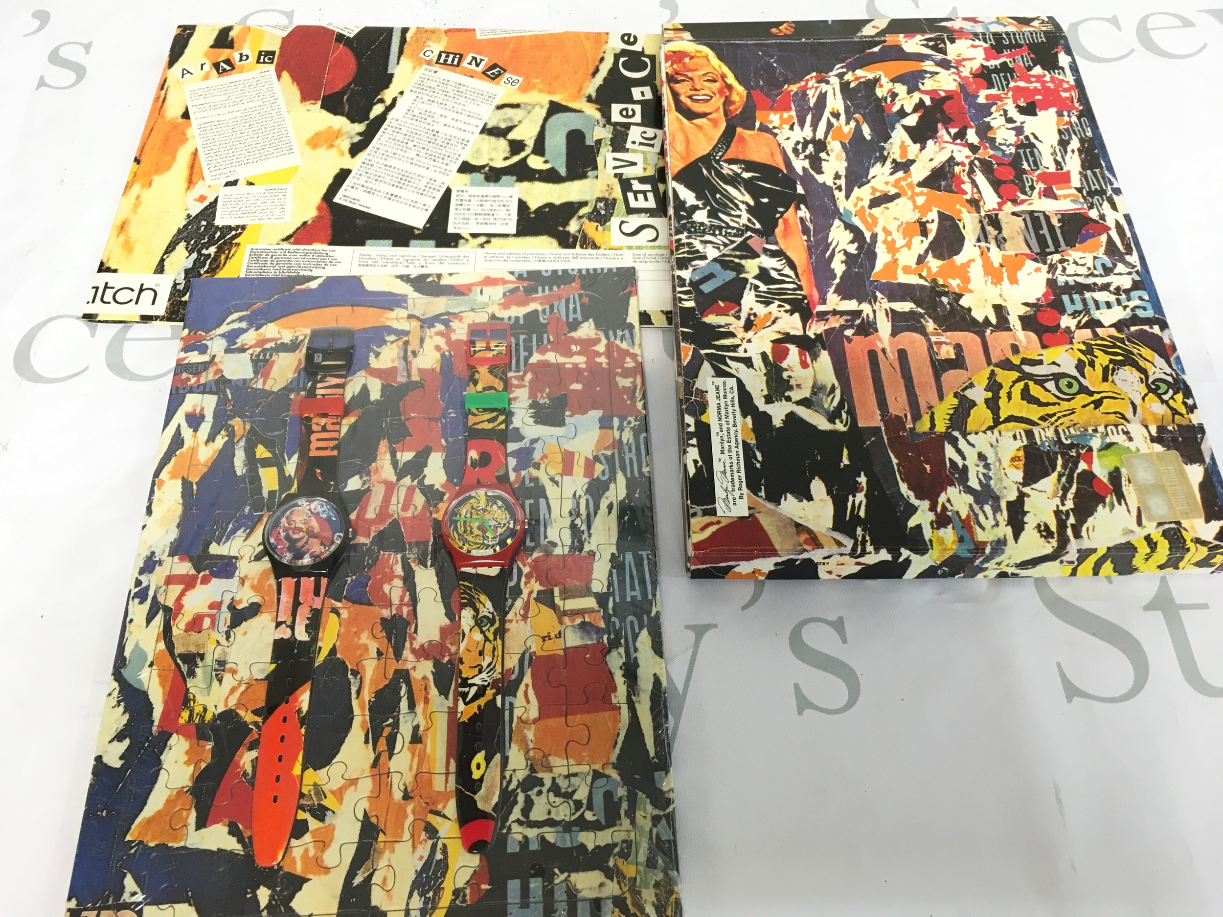 1994 limited edition Swatch "Art Special" set (GZS04) designed by artist Mimmo Rotella, featuring Marilyn Monroe and a Bengal tiger on a puzzle board.