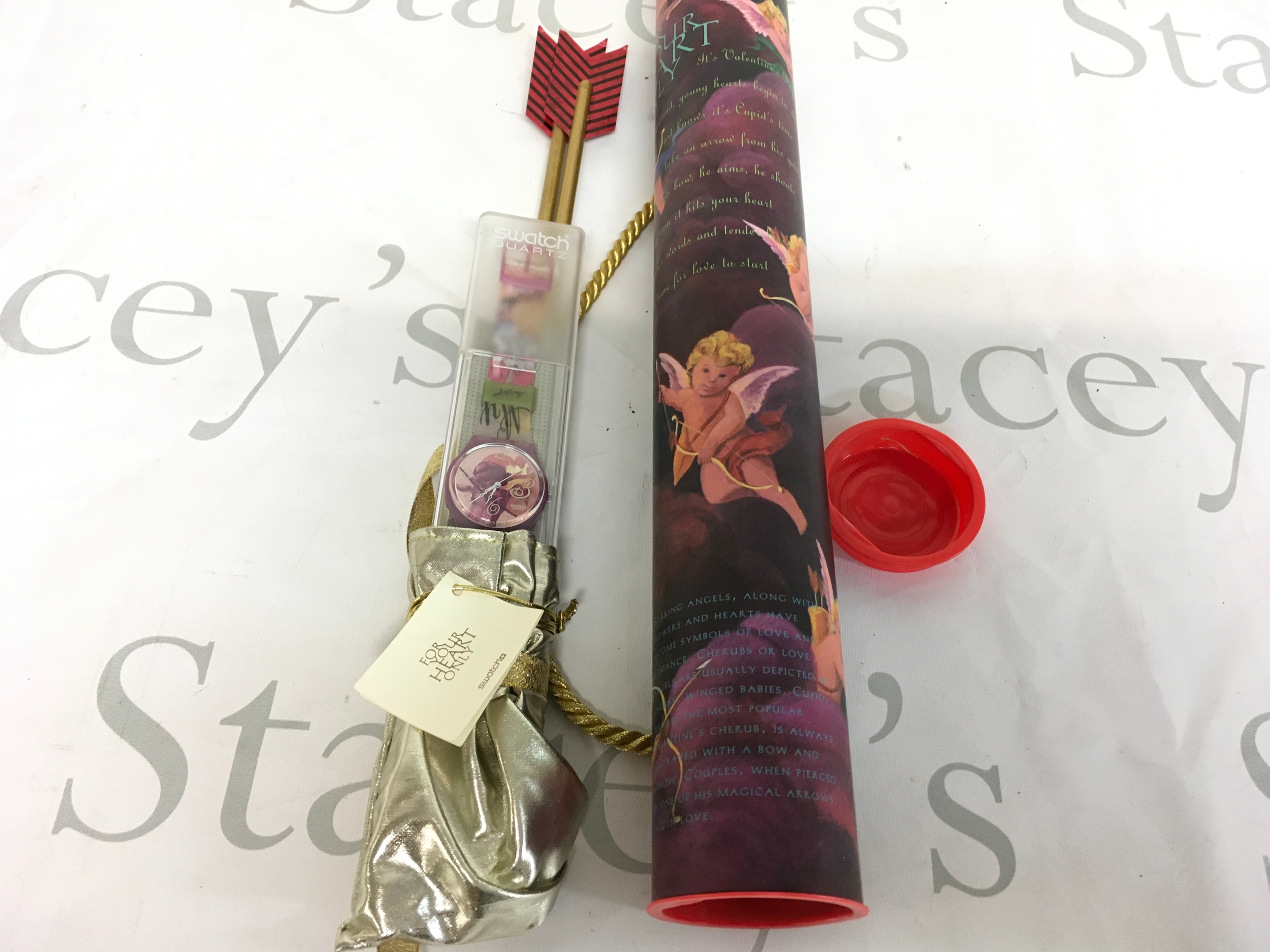1995 Swatch "For Your Heart Only" Valentine's Day Special watch. The watch comes in its original special packaging, which includes a silver-colored pouch and a decorative tube featuring a cherub design.