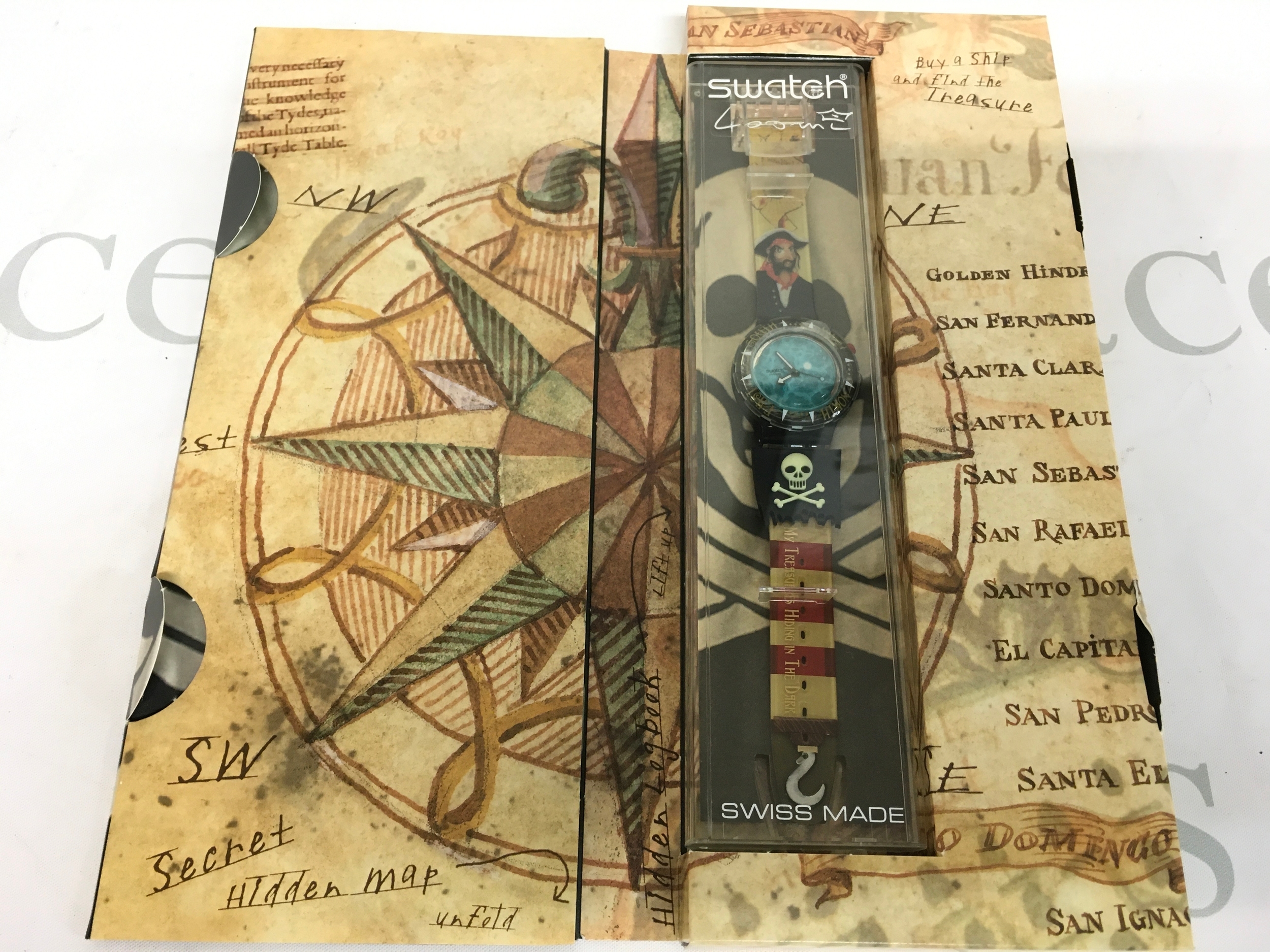 Swatch Scuba 200 "Pirate" (model SDB902) from 1999, featuring a unique pirate-themed graphic on the strap and dial.
