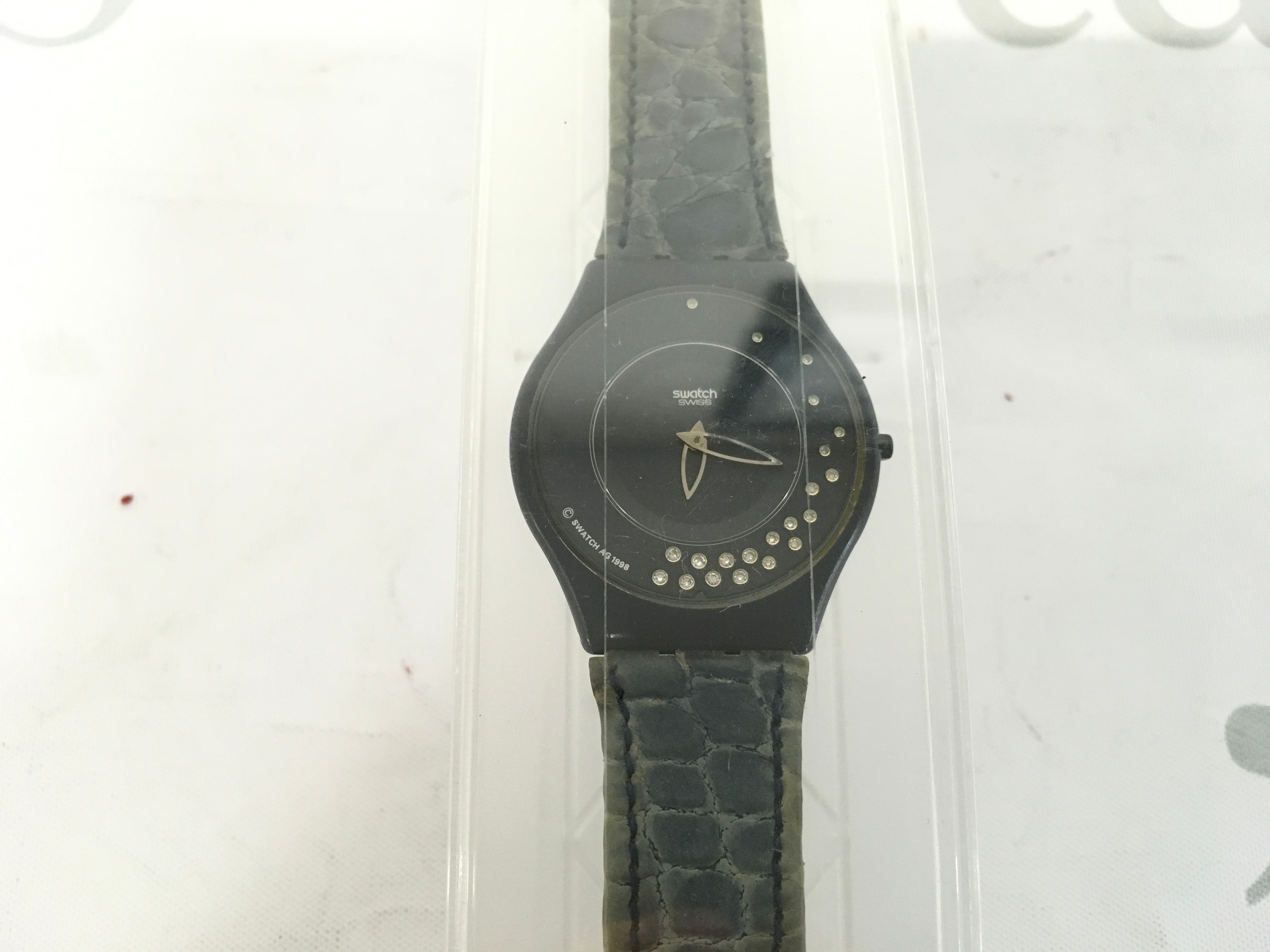 vintage 1998 Swatch Skin "La Nuit Etoilee" (SFZ101) featuring 21 diamonds on the dial and a crocodile-pattern leather strap