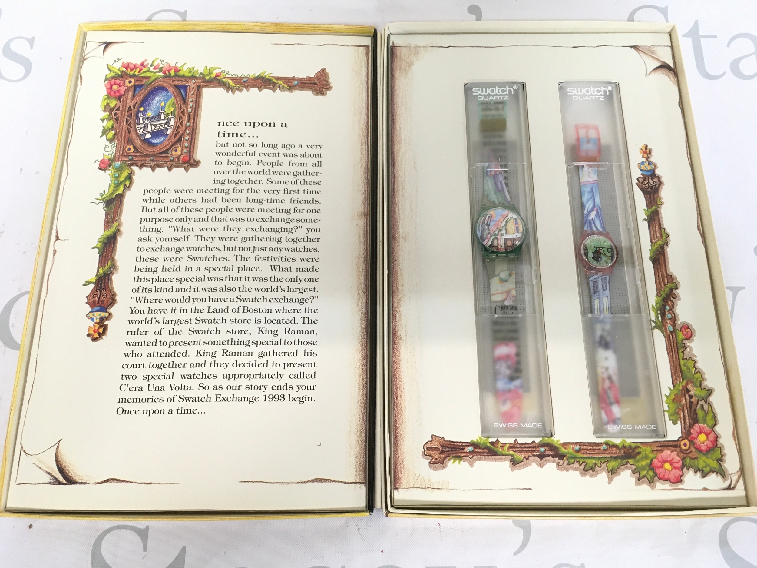 1993 "Once Upon a Time" Swatch Boston Book special edition packaging set. The set includes two watches: a Gent "Le Chat Botte" (GG123) and a Lady "La Belle Au Bois Dormant" (LP114). It was limited to 999 pieces and released in Boston, USA. The packaging features a fairytale storybook theme and includes a special story written inside