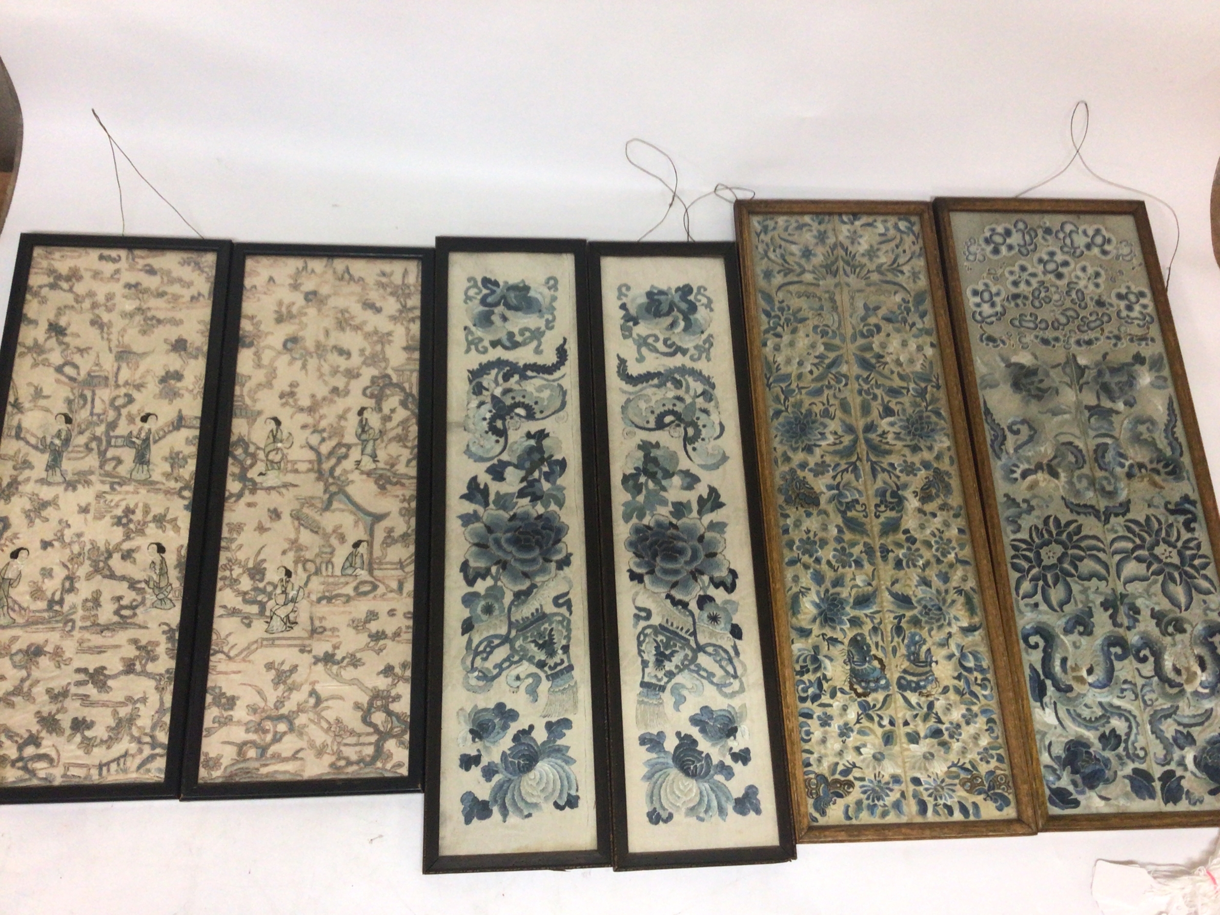  A collection of Chinese embroidered Sleeve Panels. from the late Qing Dynasty.19th century Presented in three framed pairs. 