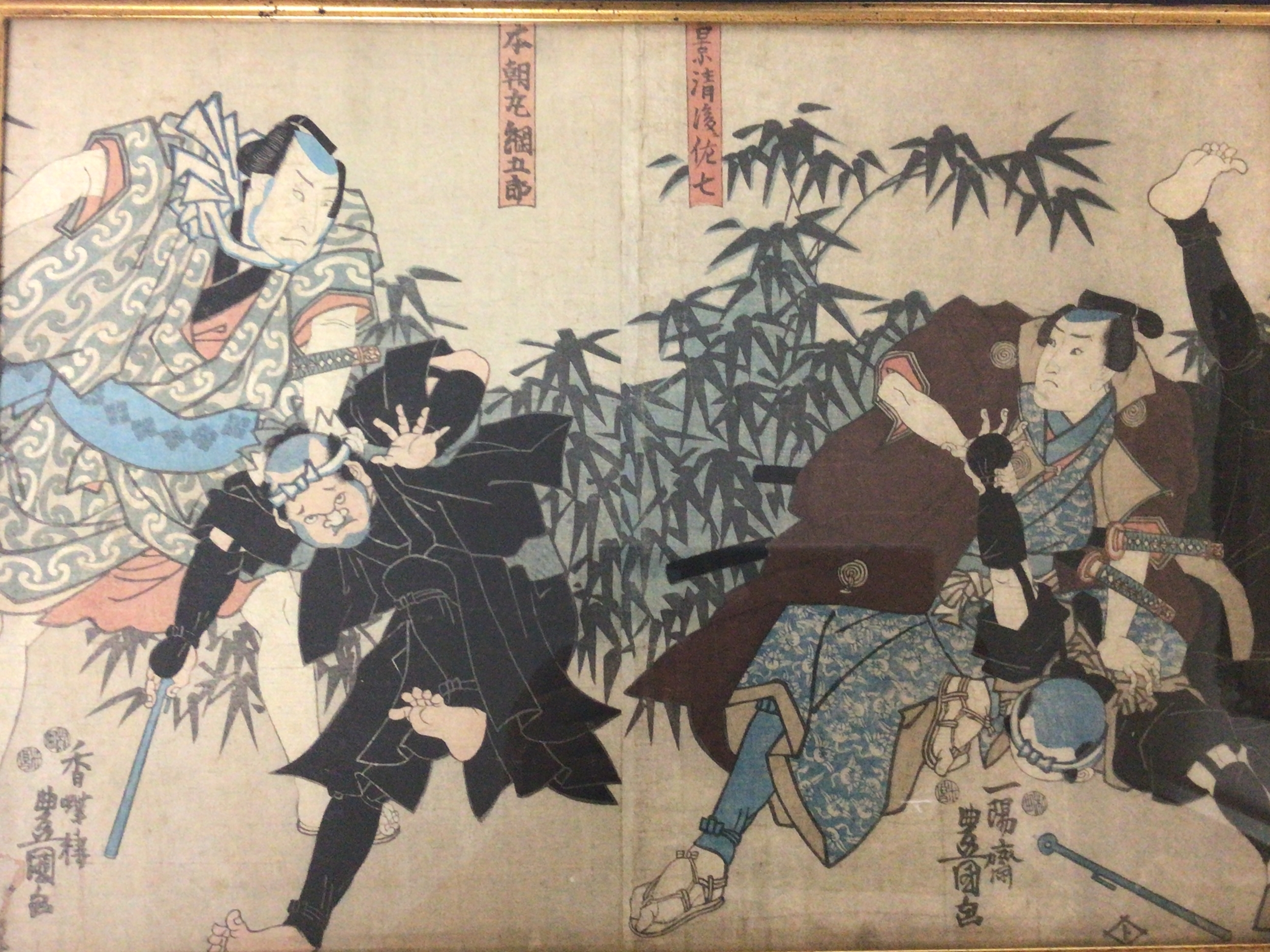  A 19th century Edo Period Japanese woodblock print of Kabuki Actors signed and attributed to Utagawa Kunisada (1786-1865) in an ebony frame 49x37cm 