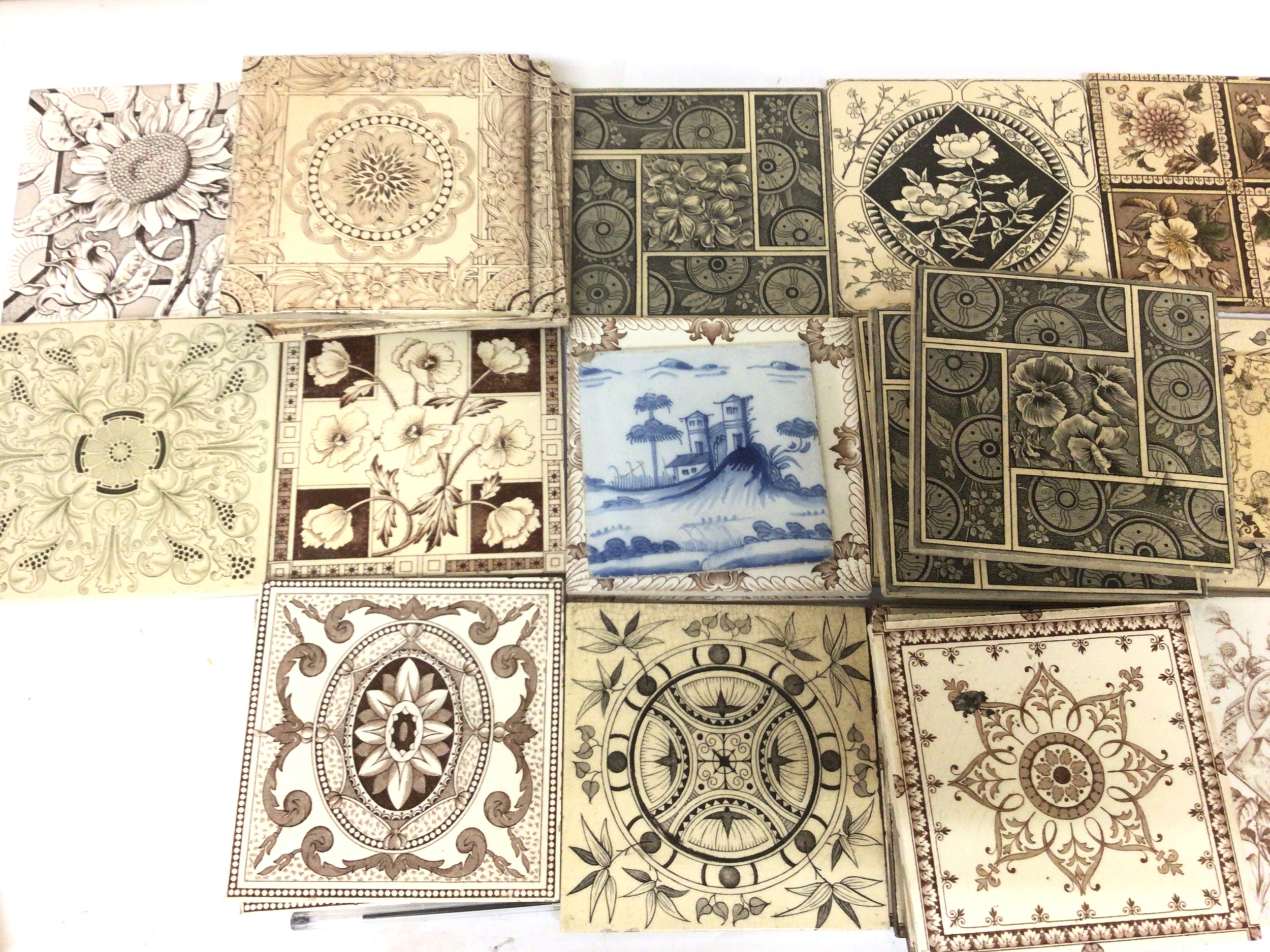  A Collection of Victorian Ceramic tiles mixed patterns including pairs and sets of tiles g