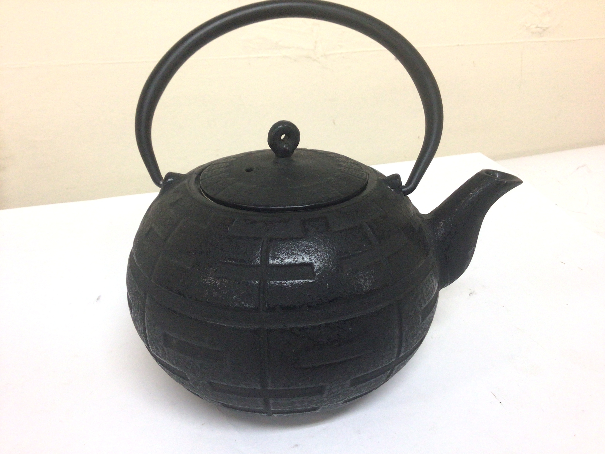  A Japanese cast metal tea pot 20th century 