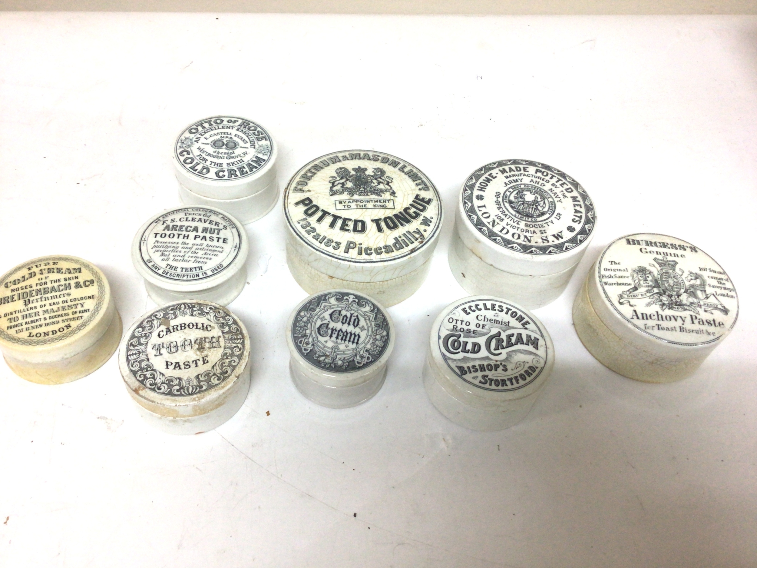  A collection of Victorian pot lids coals cream, Tooth Paste Anchovy Paste and Potted Tongue 